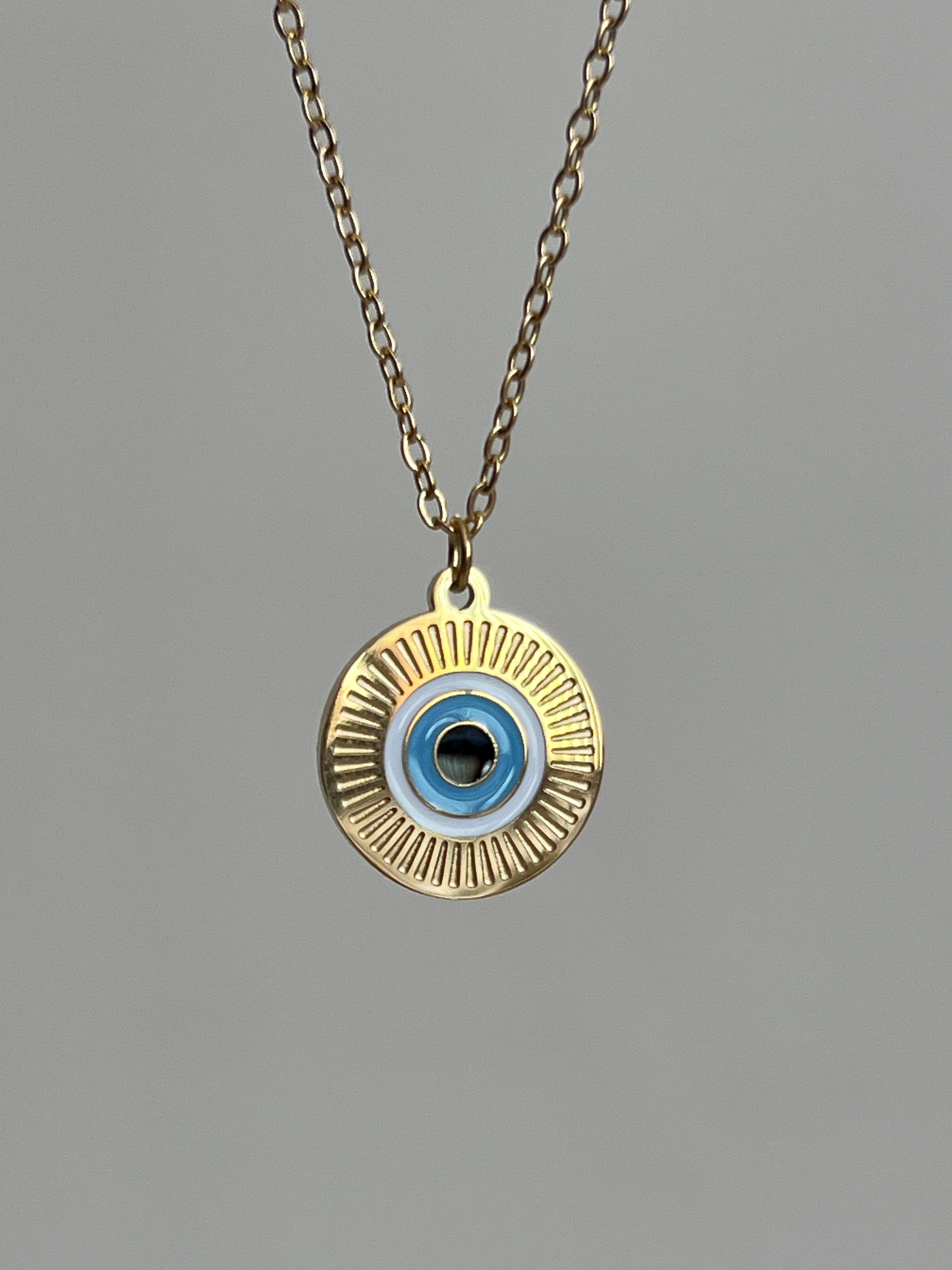 Gold Rengi Göz Desenli Yuvarlak Model Kadın Kolye