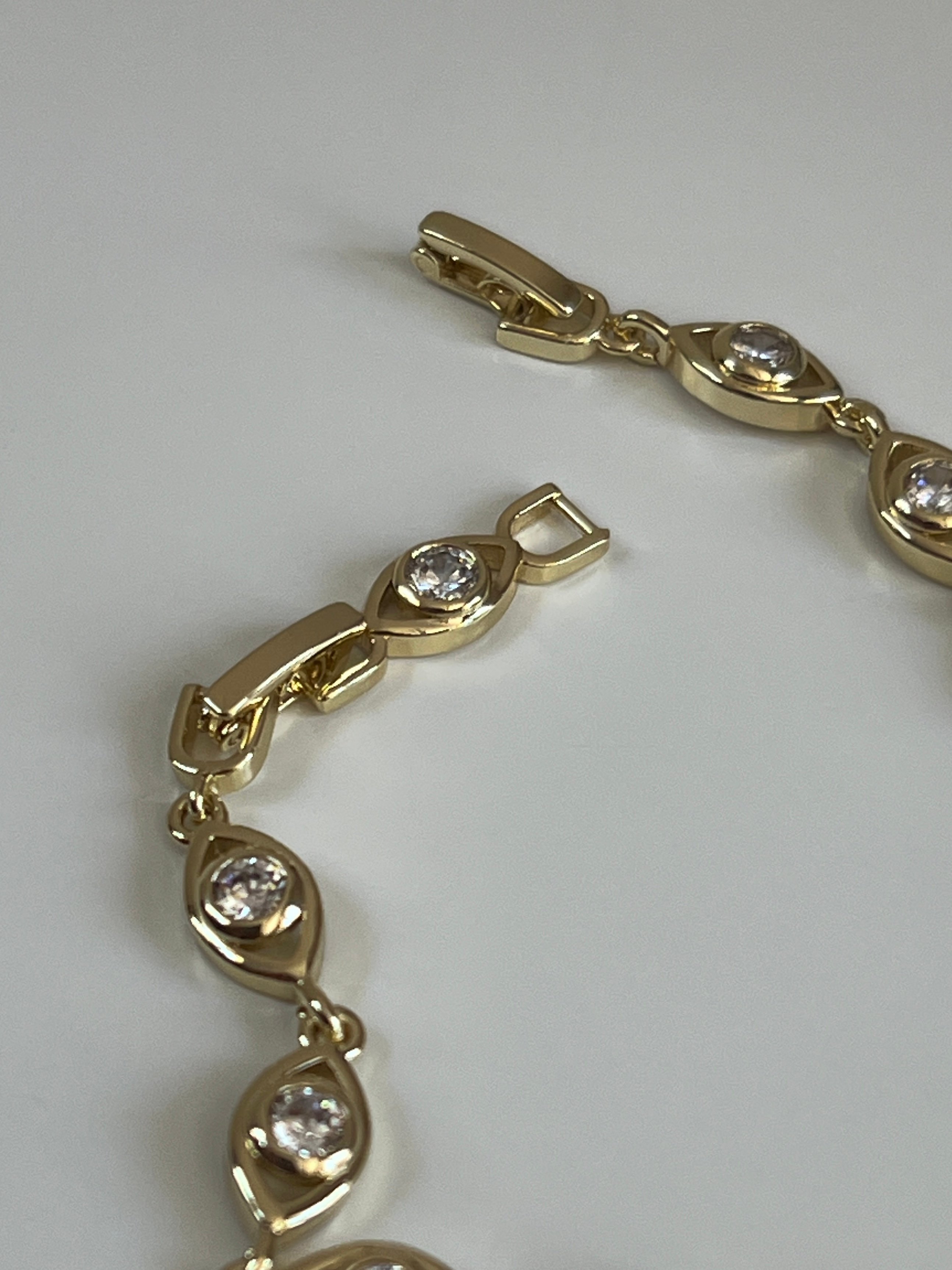 Gold Rengi Zirkon Taşlı Sıralı Göz Model Kadın Bileklik