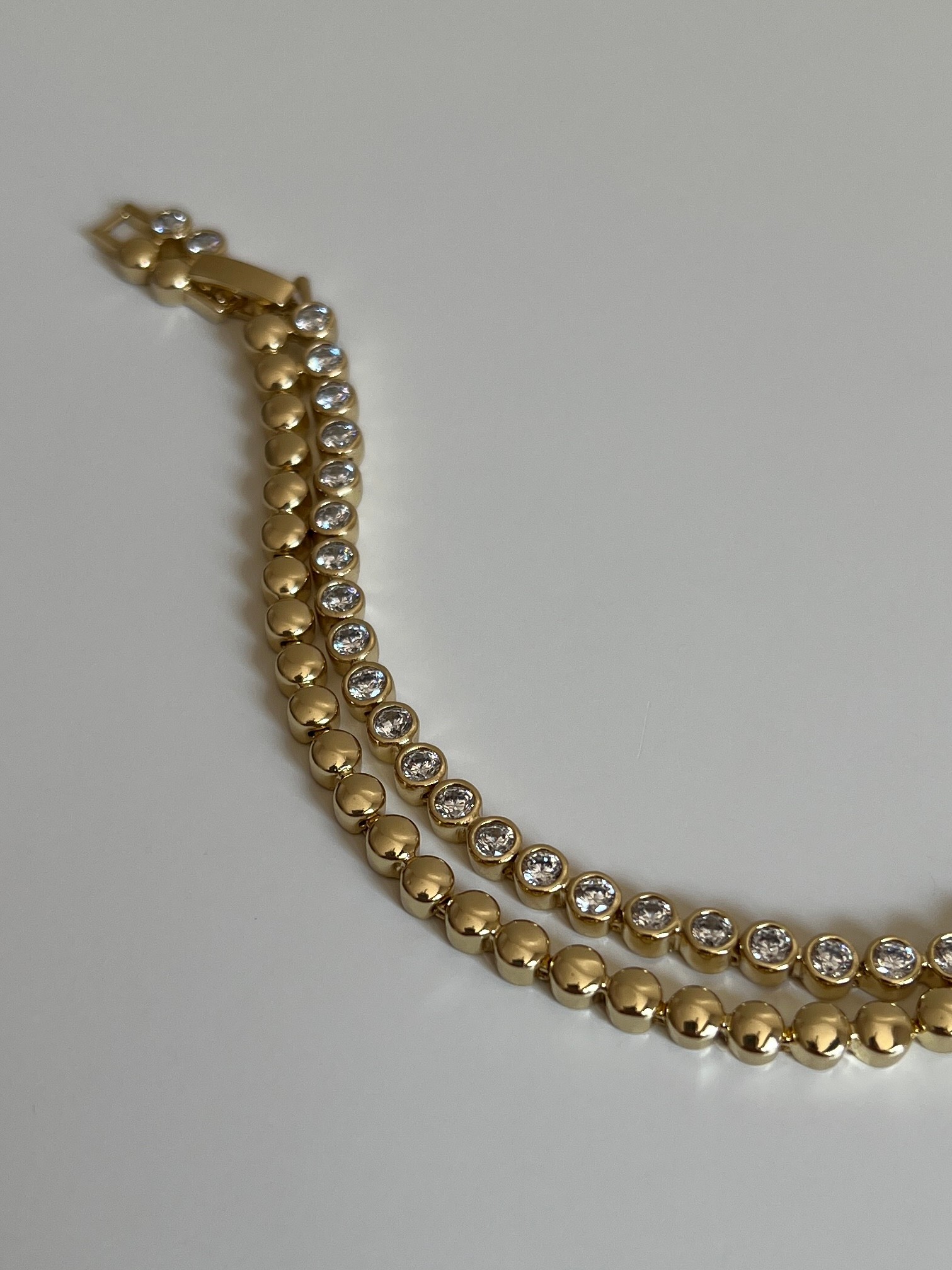 Gold Rengi Sıralı Yuvarlak Zirkon Taşlı İki Sıra Xupıng Kadın Bileklik