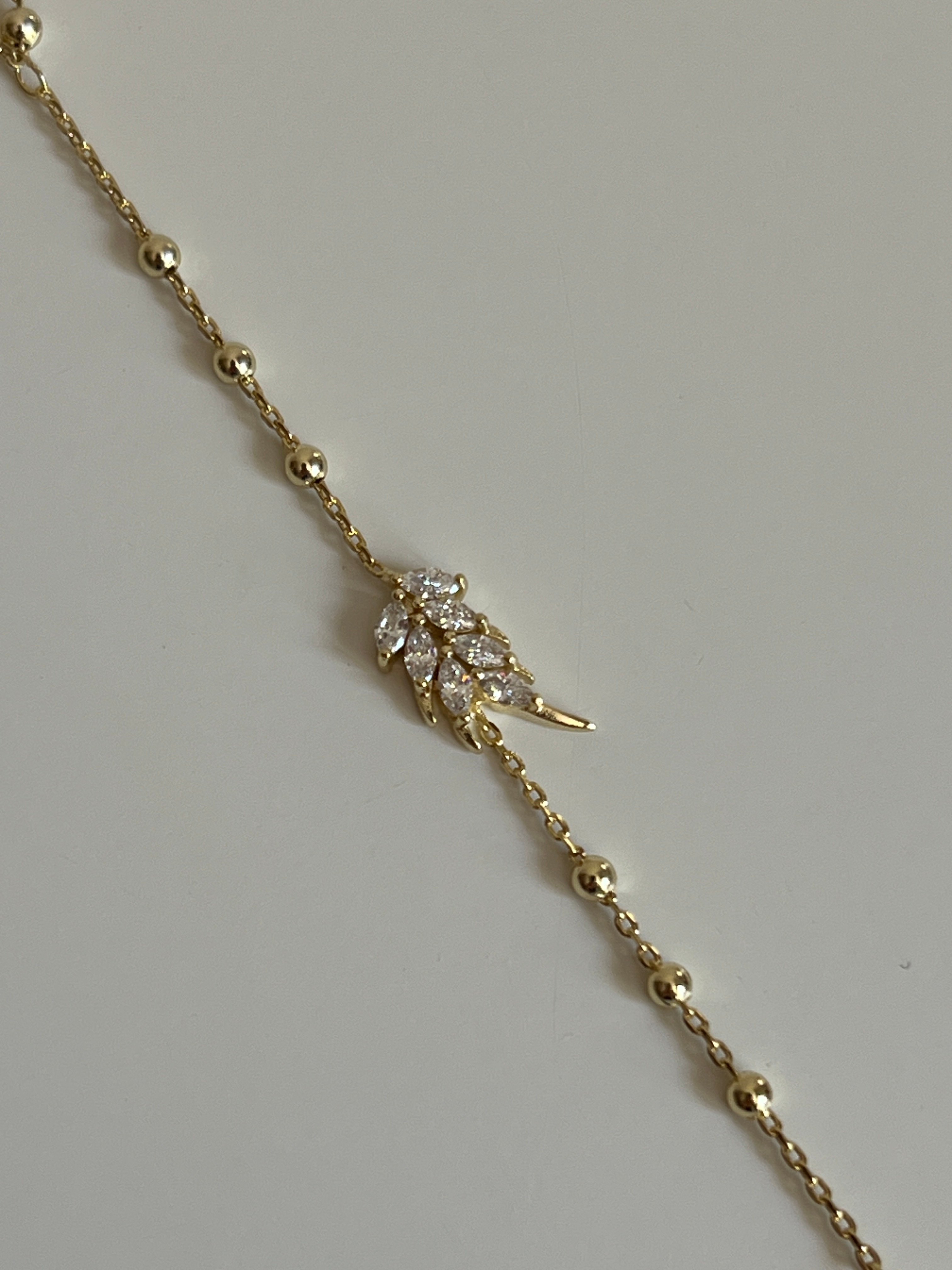 Gold Rengi Zirkon Taşlı Yaprak Model Top Top Zincirli Kadın Şahmeran