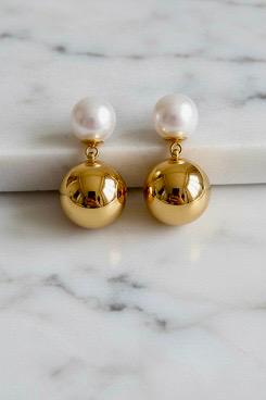 Nyorker, Top inci Küpe