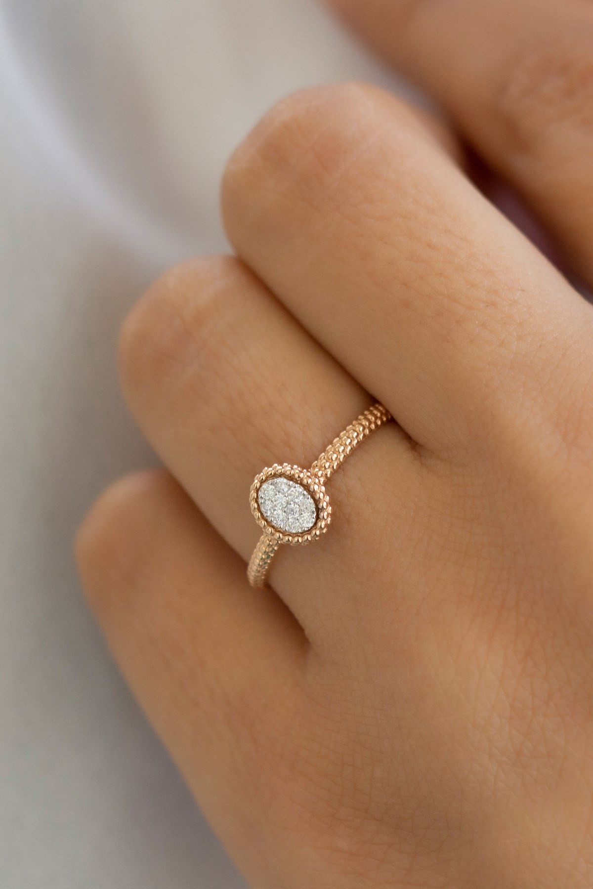 Minaliva 14 carat Roz Gold Diamond Oval Design Ring 0.12CT G Color vs1 Crail