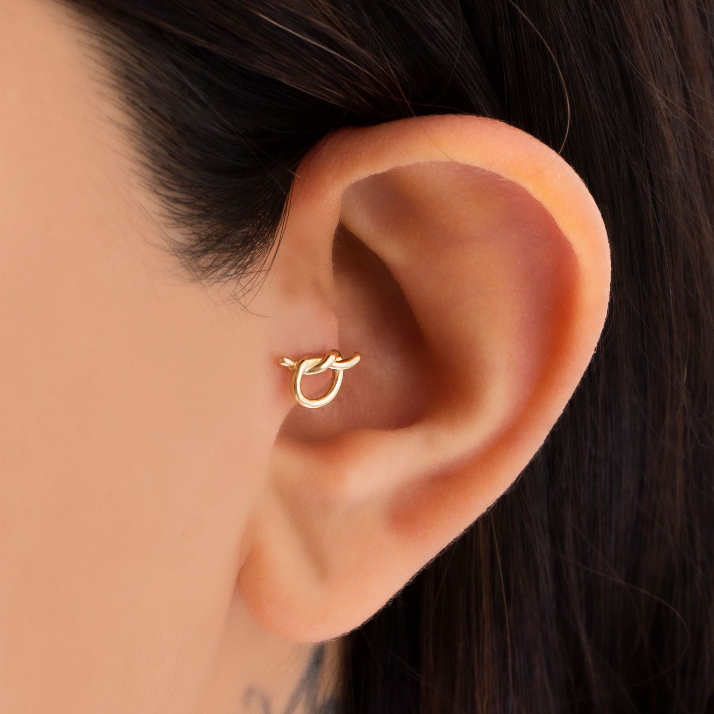 14 Carat Gold Knot Piercing