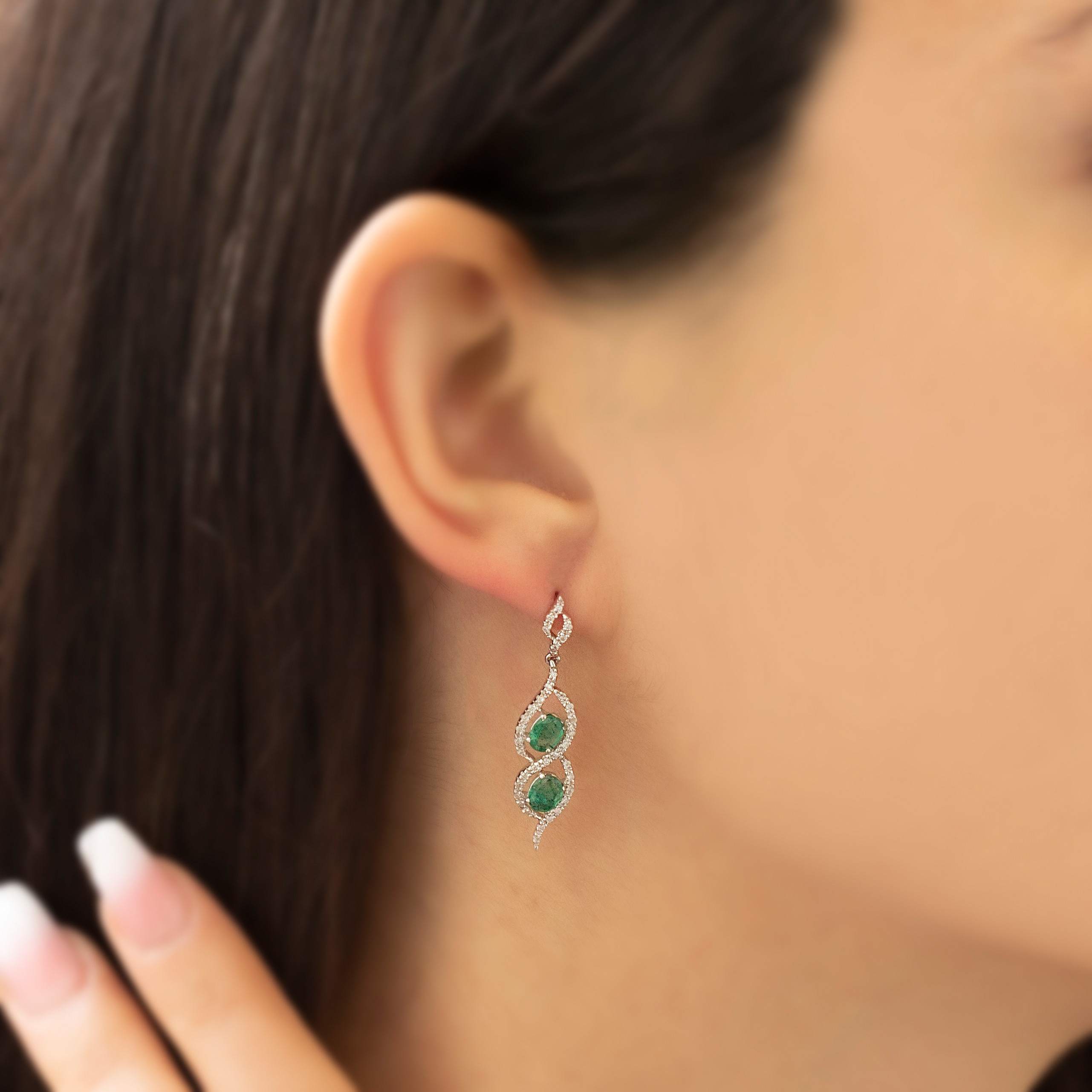 Curved Design Diamond Earrings with Gold Emerald Stones