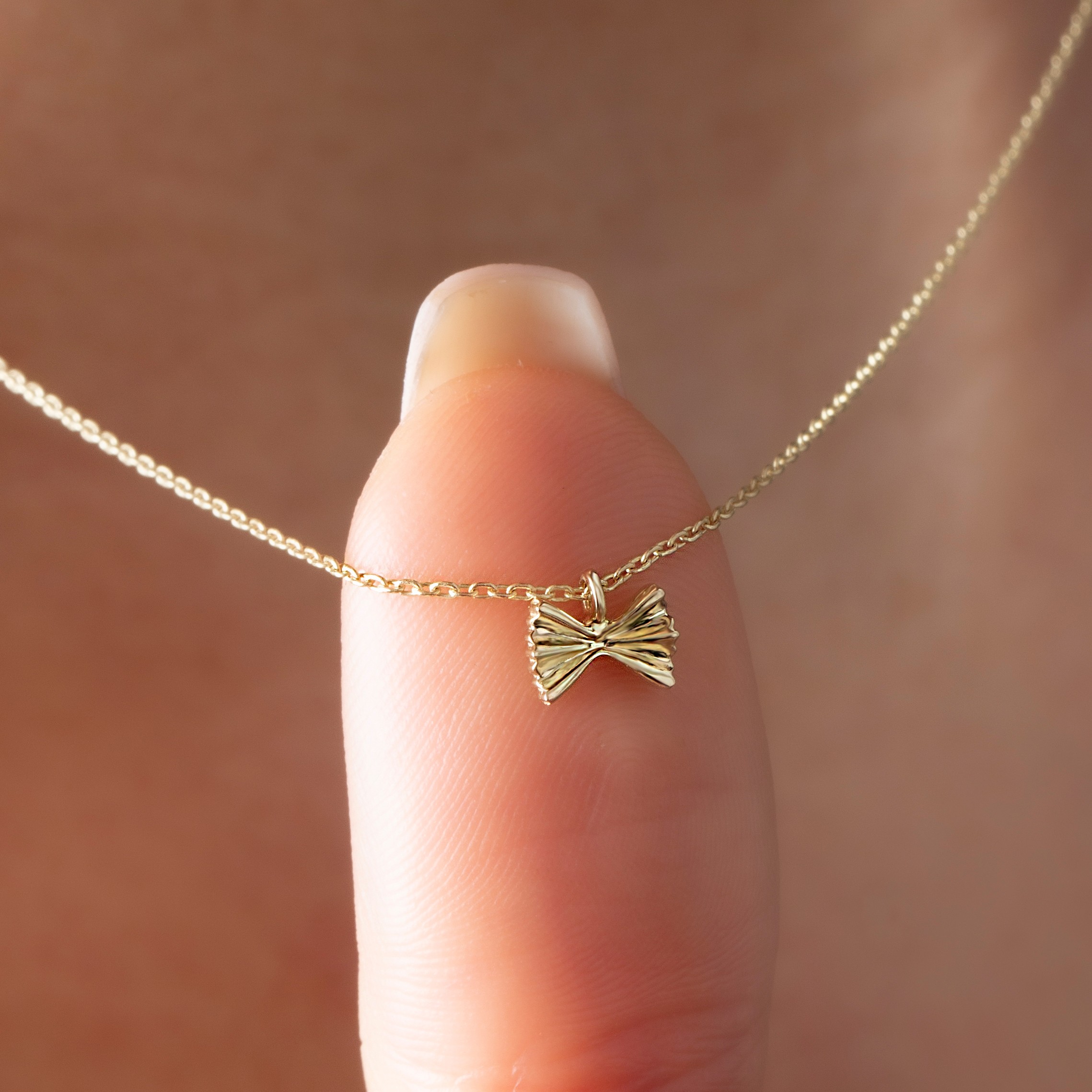 14 Carat Gold Bow Tie Necklace