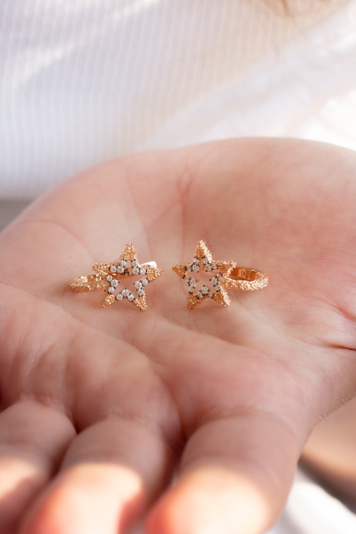 Star design store gold earrings