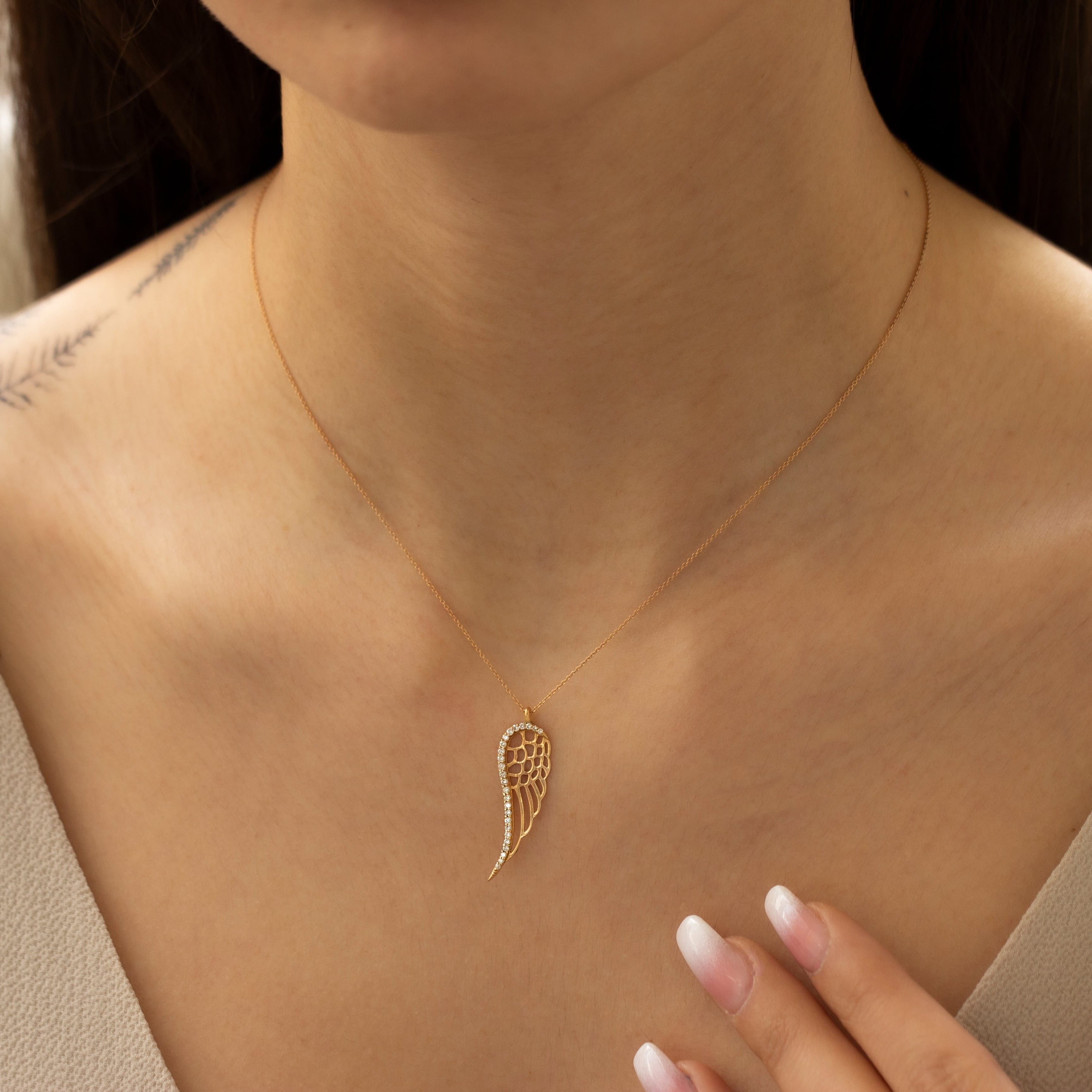 Gold Wing Figure Diamond Necklace