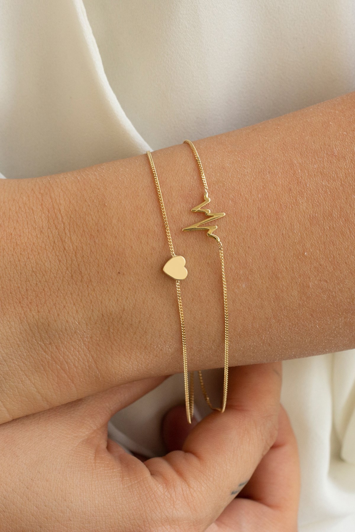 14 Carat Gold Heartbeat Bracelet