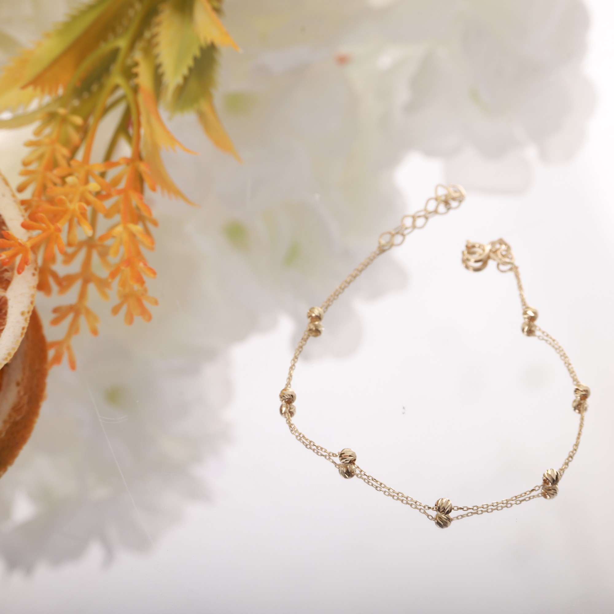 Elegant Bracelet with 14 Carat Yellow Gold Ball Detail