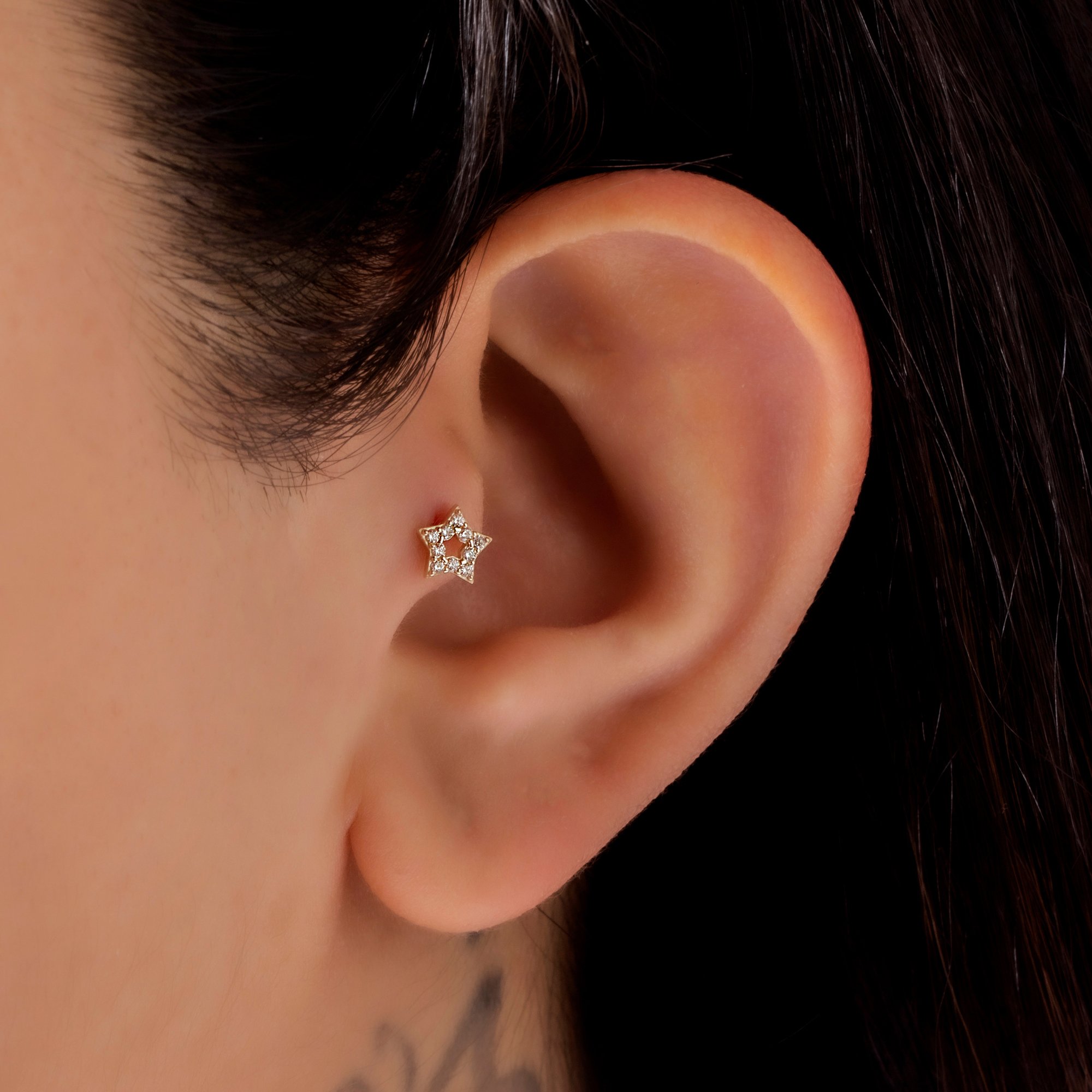 Minimal Star Piercing with 14 Carat Gold Stone