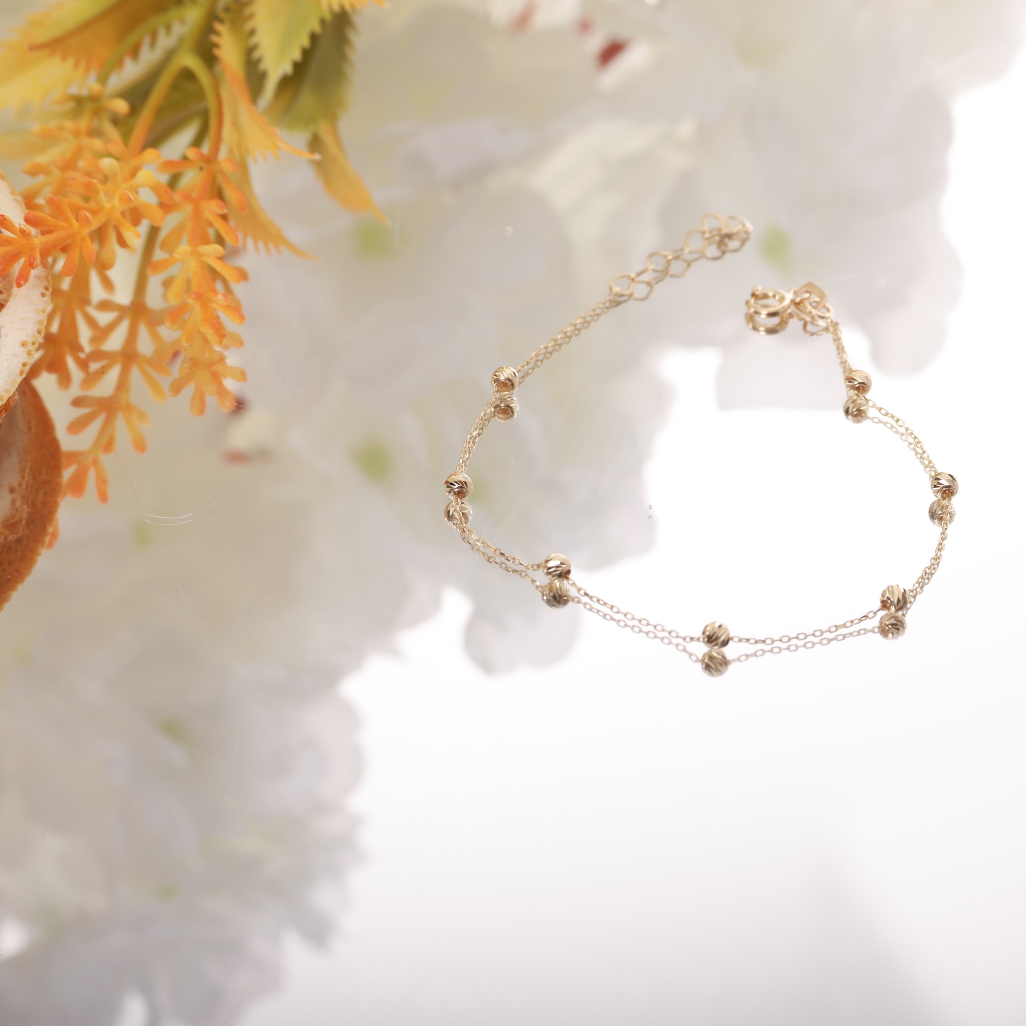 Elegant Bracelet with 14 Carat Yellow Gold Ball Detail