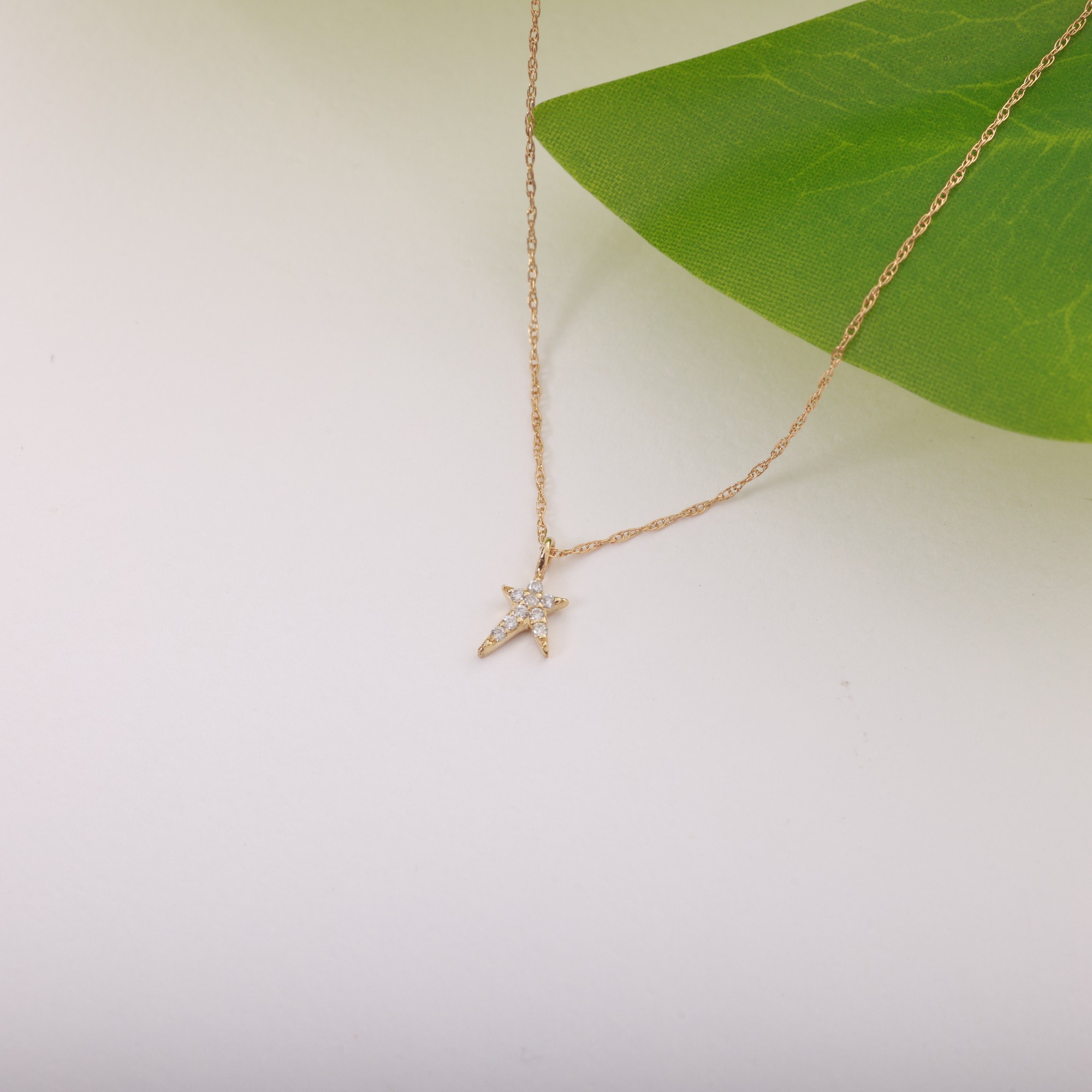 14 Carat Gold Star Necklace with Stones