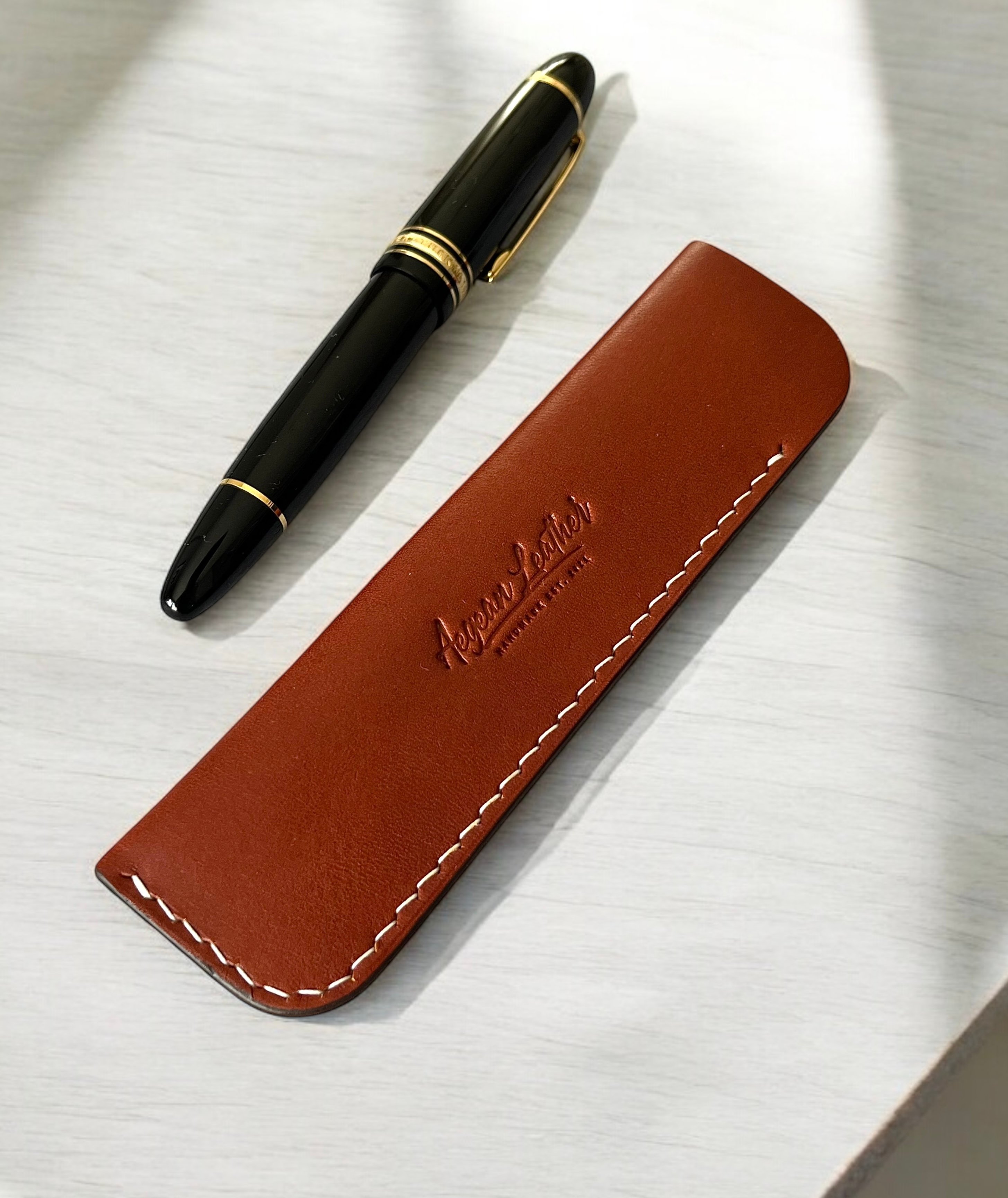 LEATHER SINGLE PEN SLEEVE-COGNAC