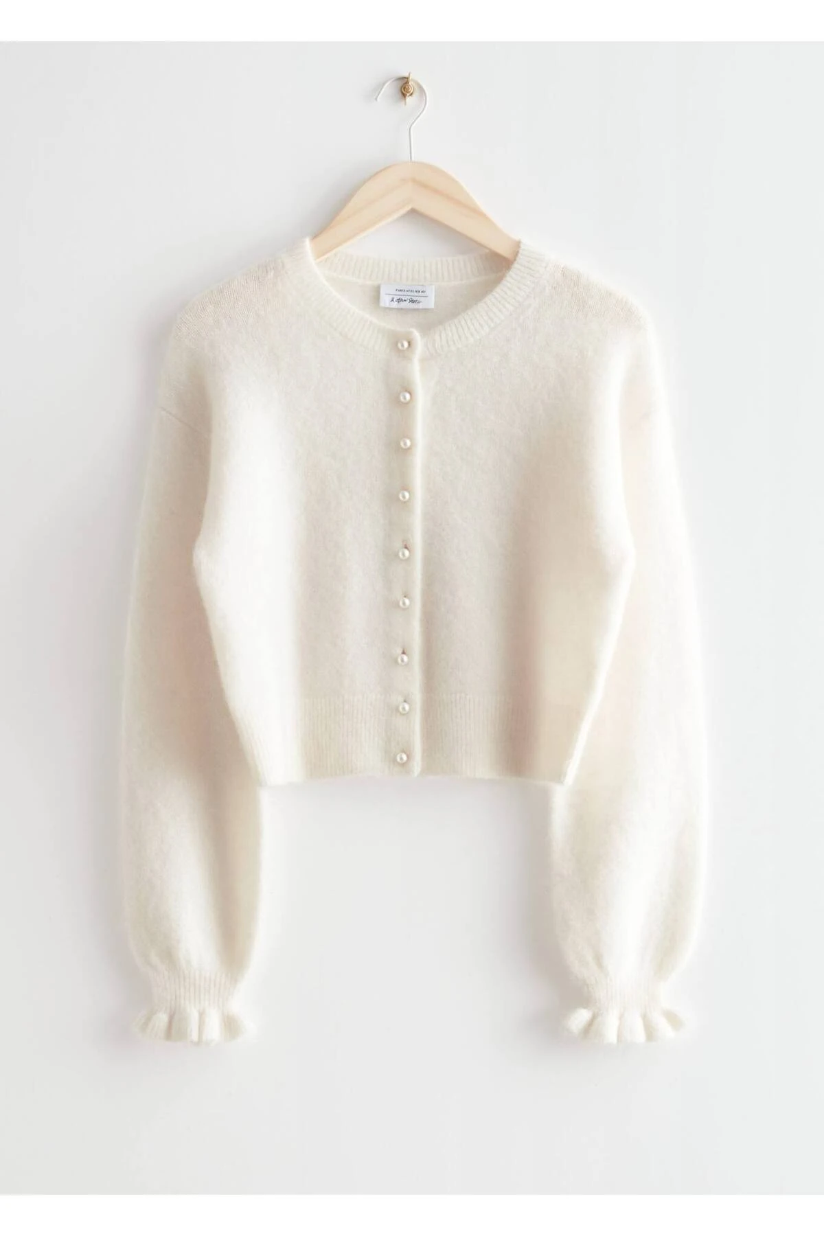 Kadın Yumoş İnci Düğmeli Kolları Fırfırlı Triko Hırka