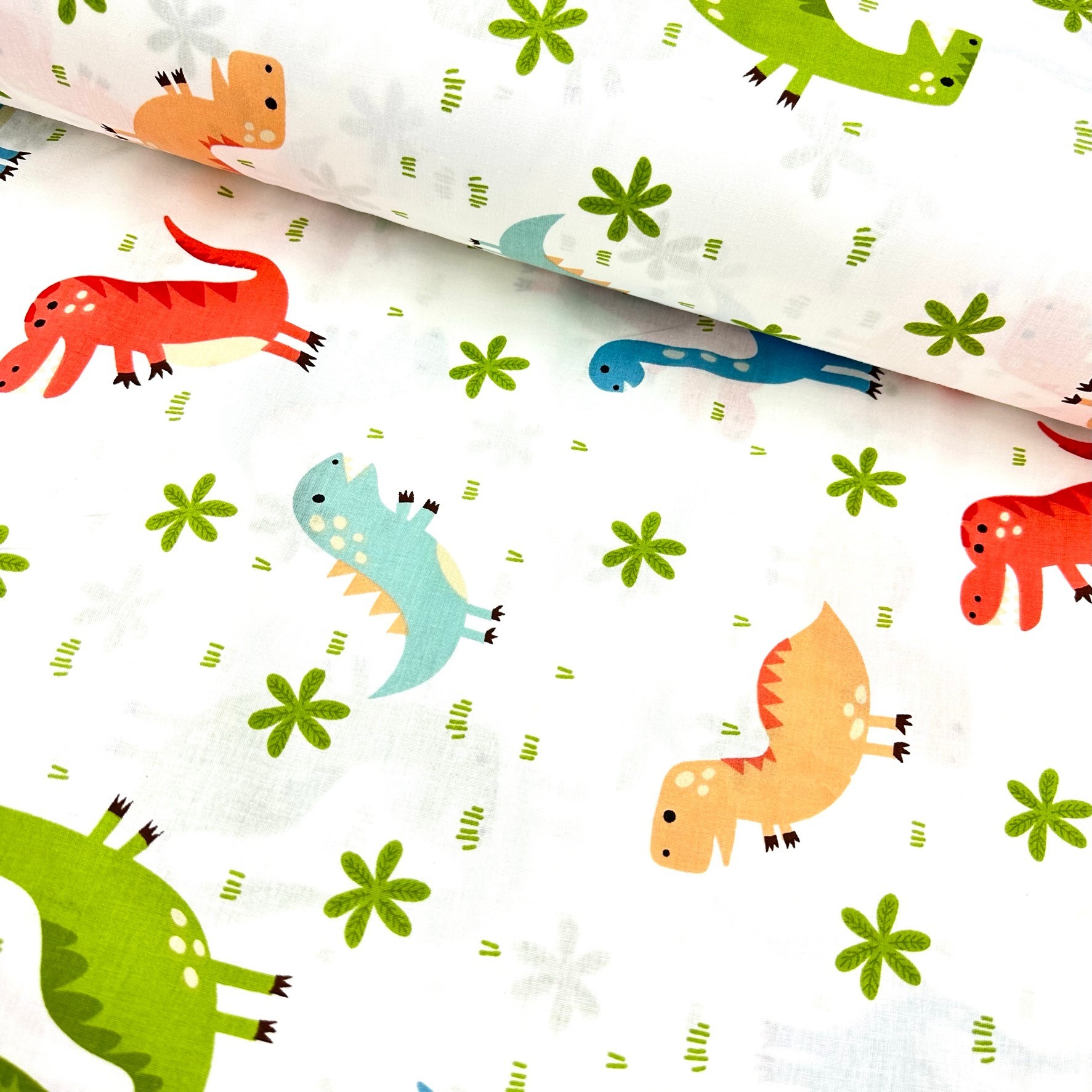 Dinosaurs In The Forest Poplin Fabric