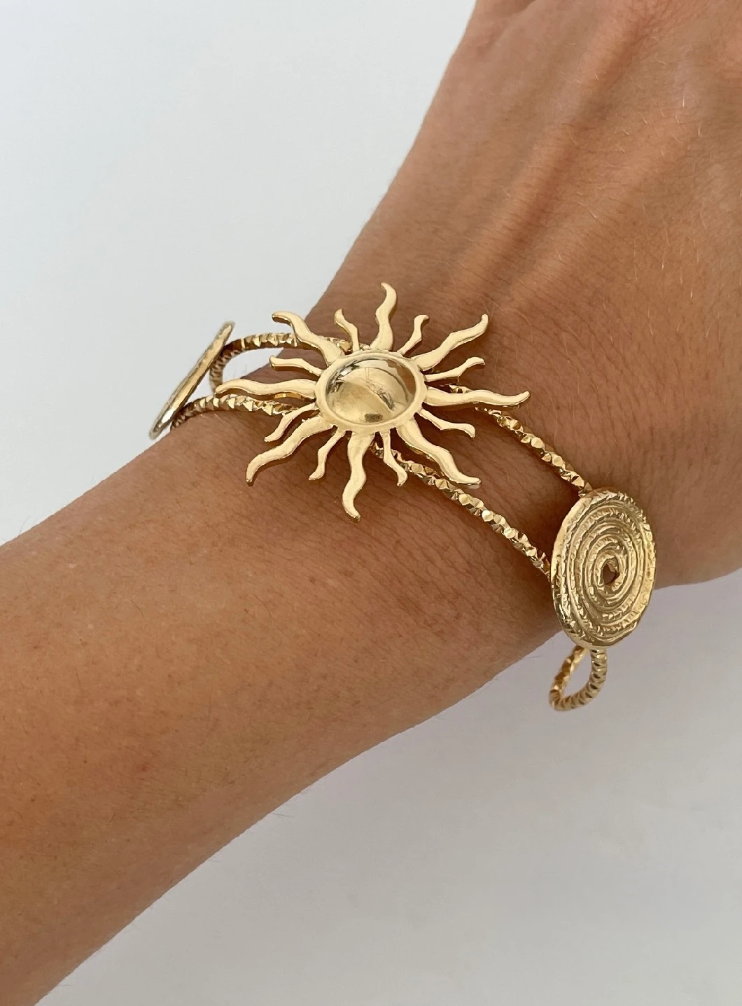 Güneş Detaylı Spiral Kelepçe – 316L Cerrahi Çelik