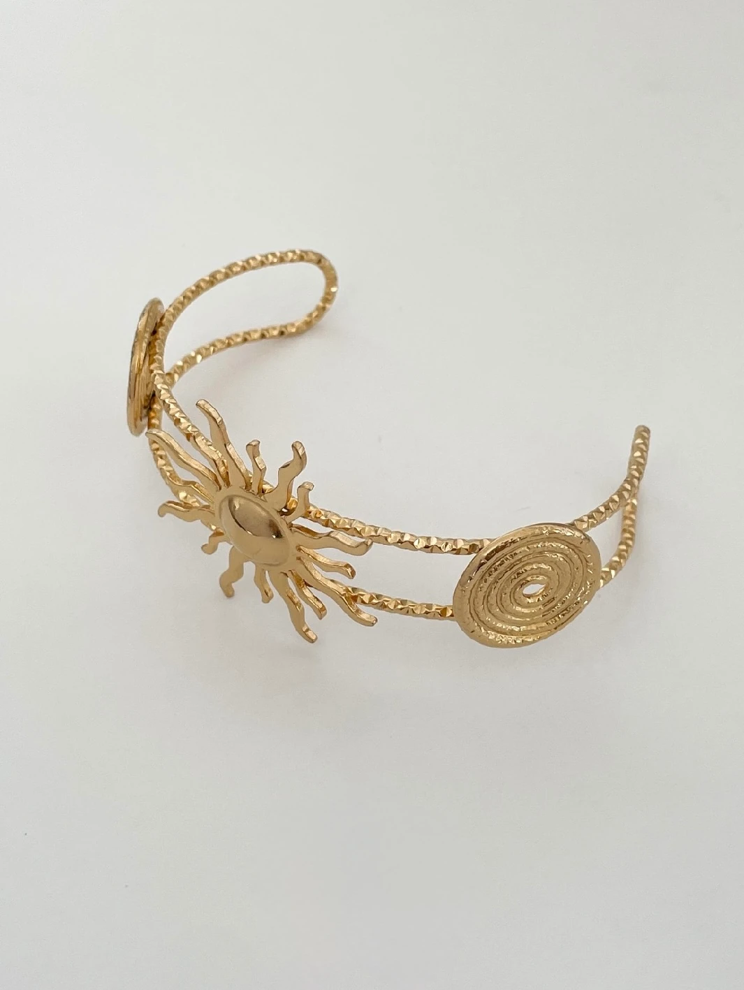 Güneş Detaylı Spiral Kelepçe – 316L Cerrahi Çelik