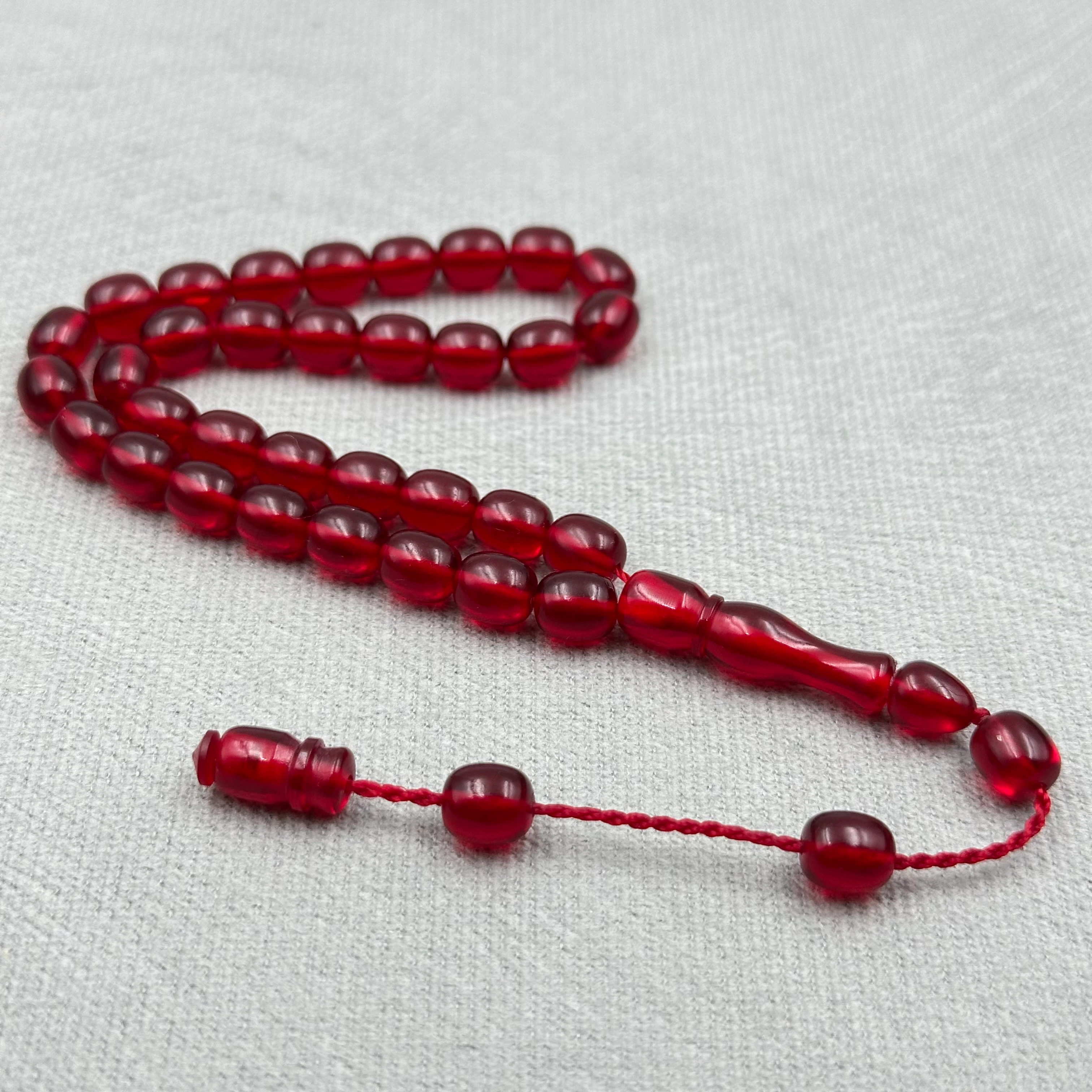 Şükrü Baba Usta İşi Şeffaf Vişne Kırmızısı Bilek Boy Katalin Tespih