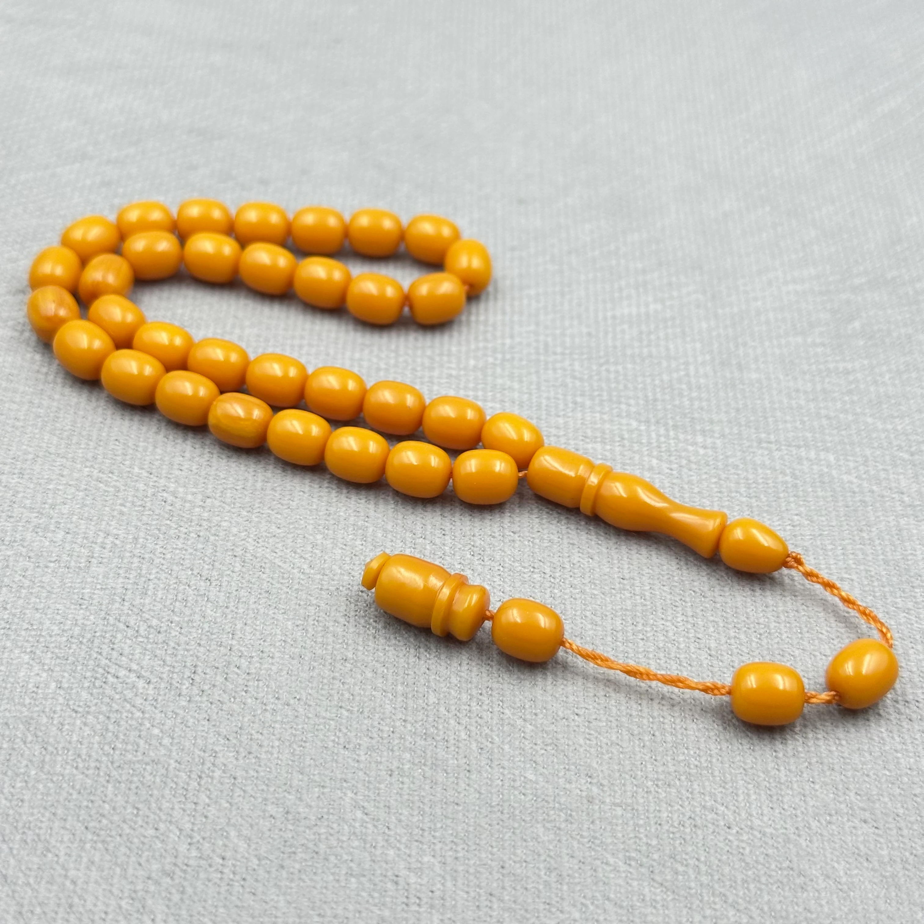 Şükrü Baba İmzalı Bal Sarısı Ton Yumurta Kesim Bilek Boy Katalin Tespih