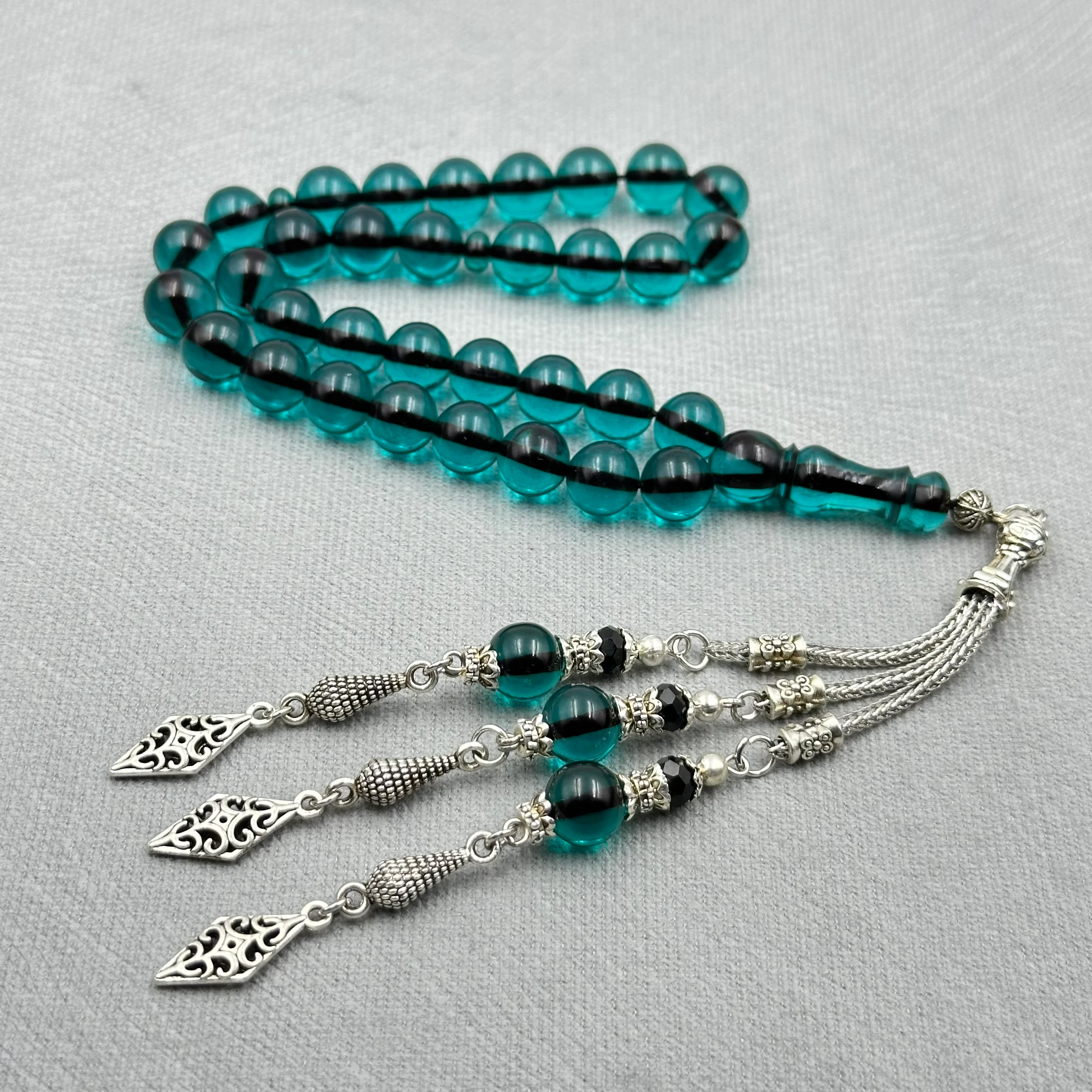 Petrol Turkuaz Küre Kesim Üçlü Alpaka Püsküllü Ateş Kehribar Tespih 