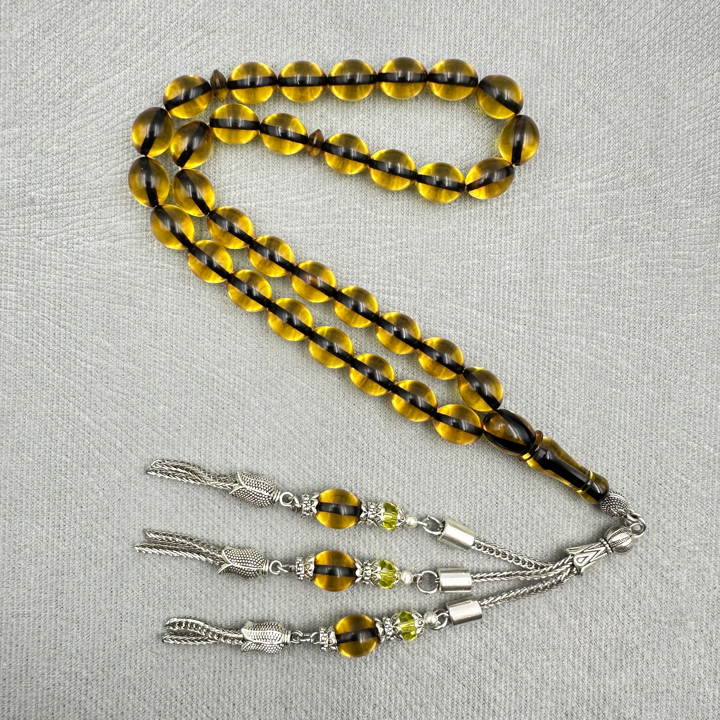 Kehribar Tonlu Şeffaf Yumurta Kesim Üçlü Alpaka Püsküllü Ateş Kehribar Tespih