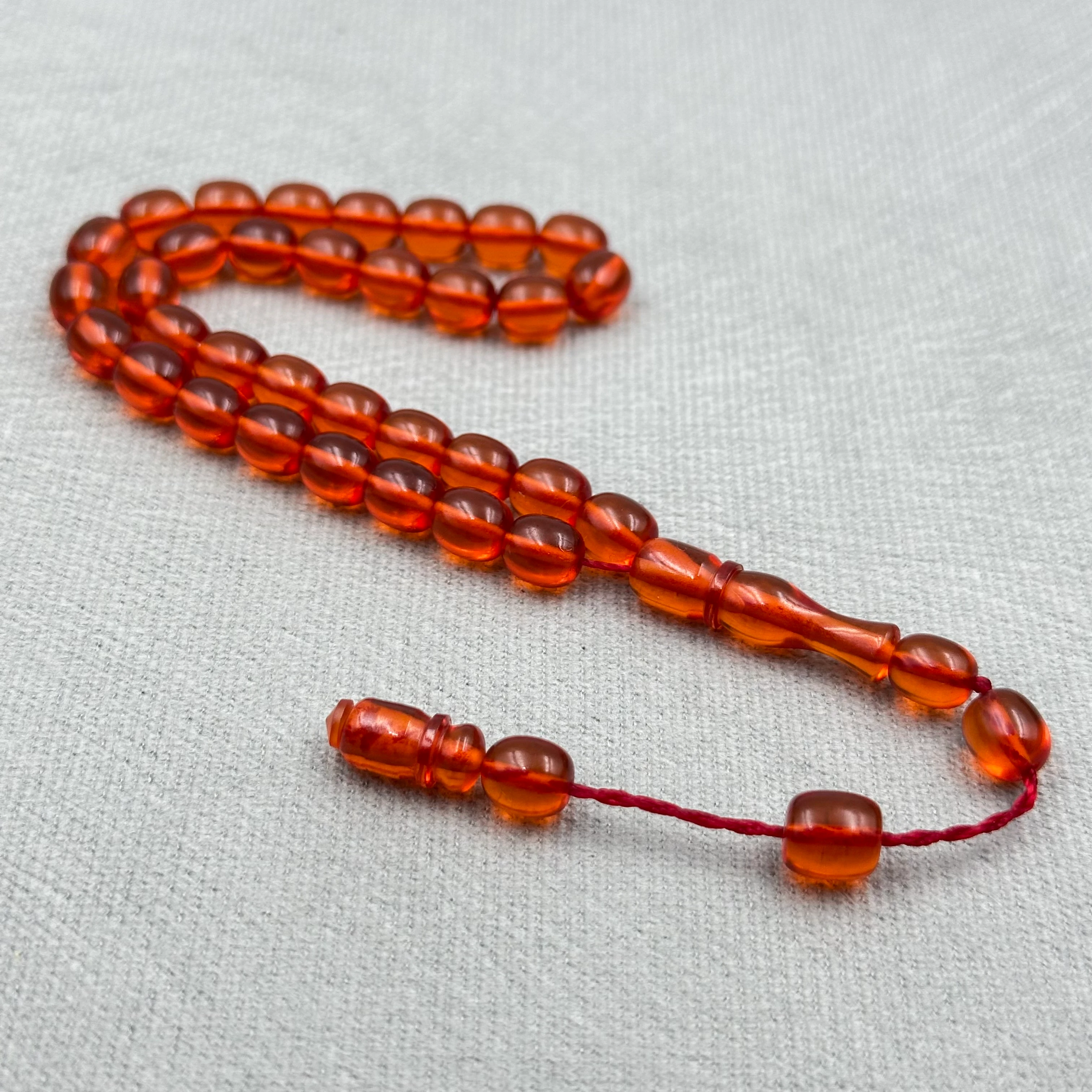 Şükrü Baba Usta İşi Şeffaf Amber Turuncu Bilek Boy Sıkma Kehribar Tespih