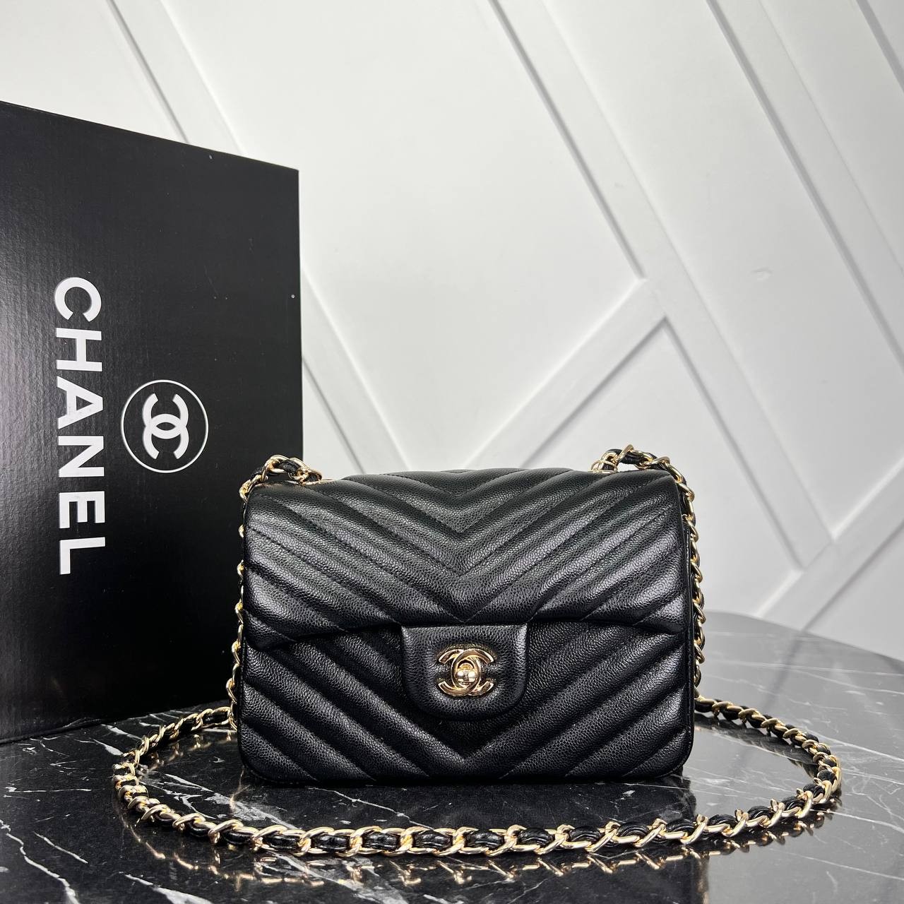 Picture of 1.55 Chevron Mini Flap Bag - Caviar Leather - Gold Hardware