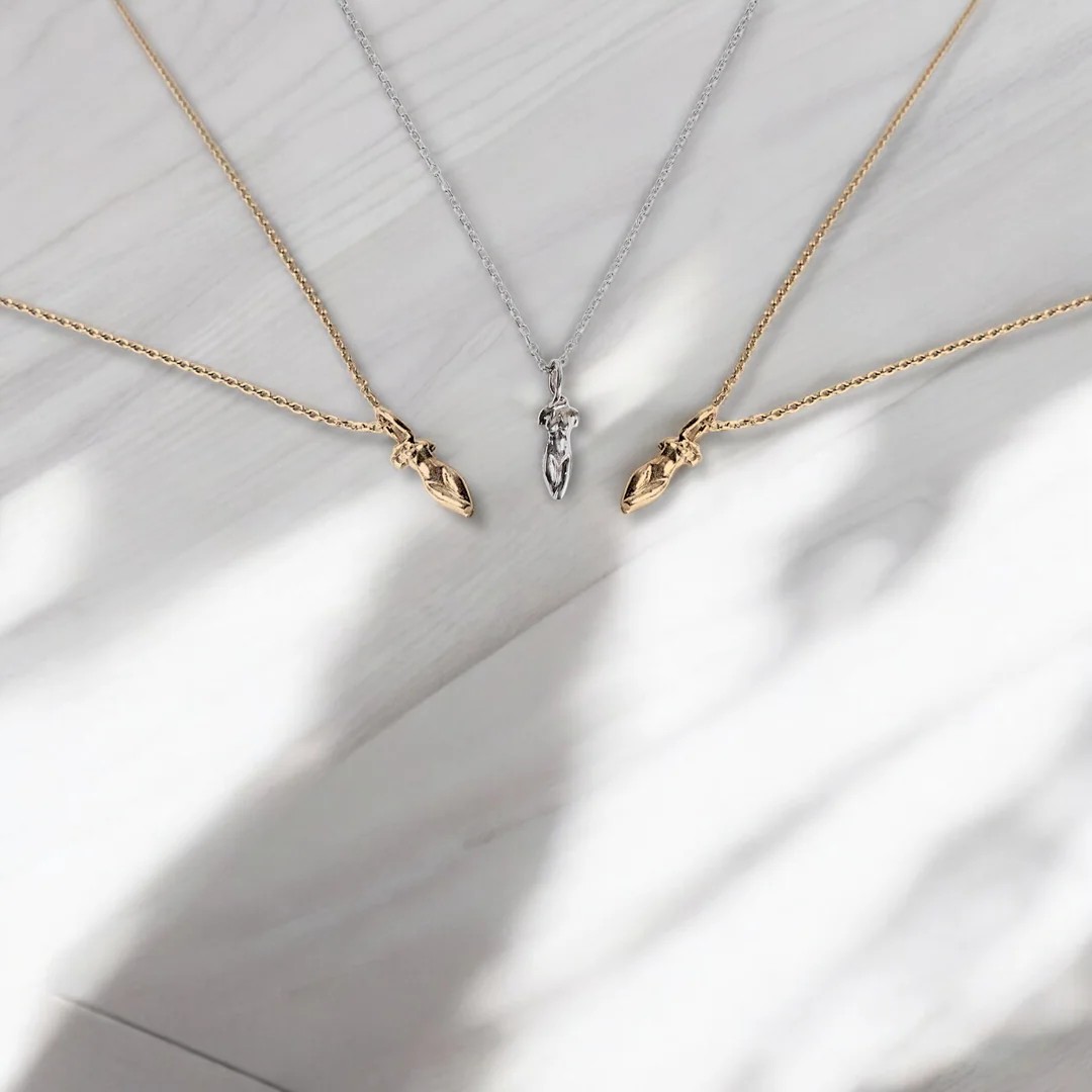 statue of a lady necklace - gold on silver