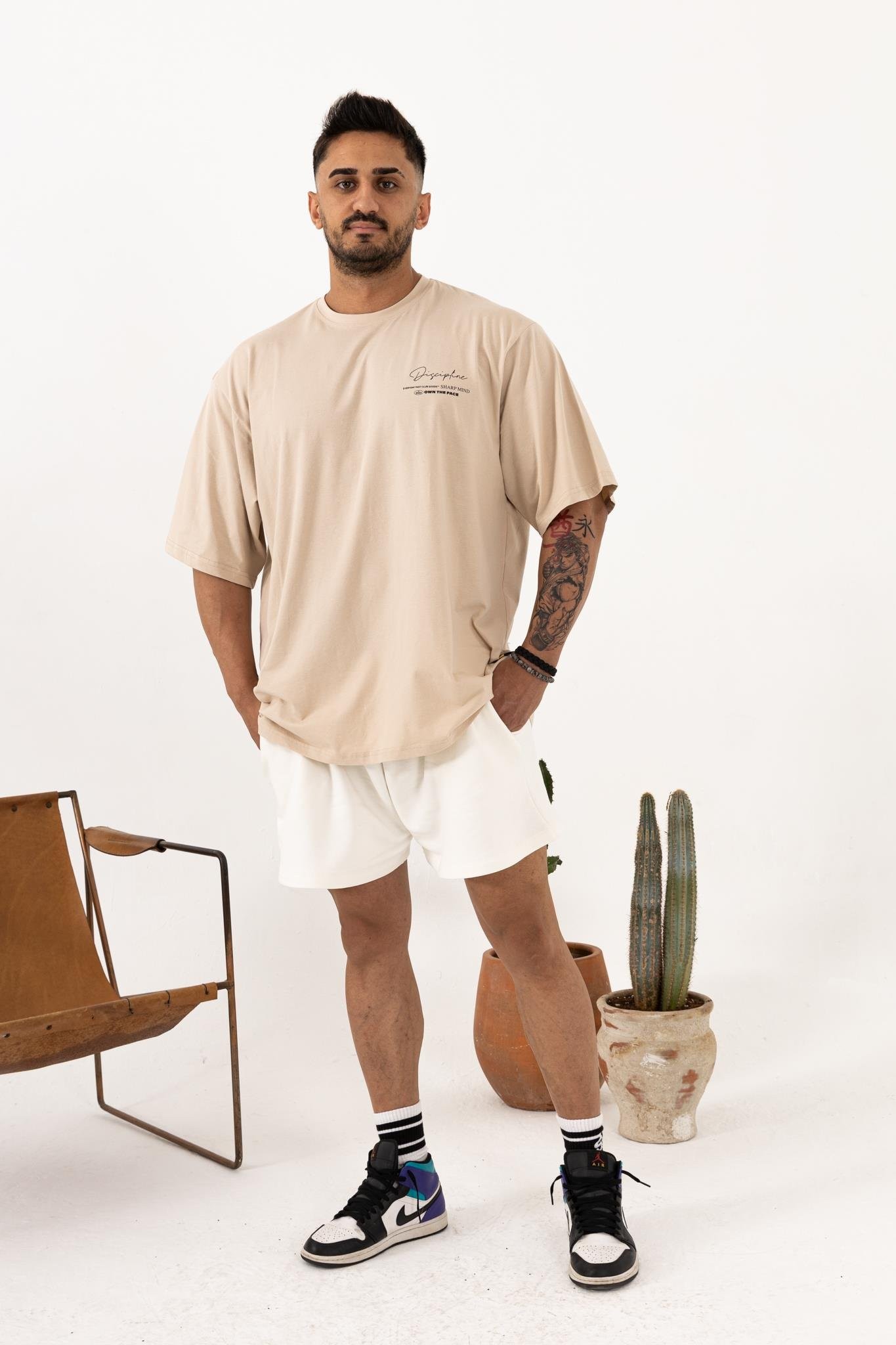 Oversize Bej T-Shirt – Erkek Rahat Kalıp Günlük Giyim (Discipline Baskılı)
