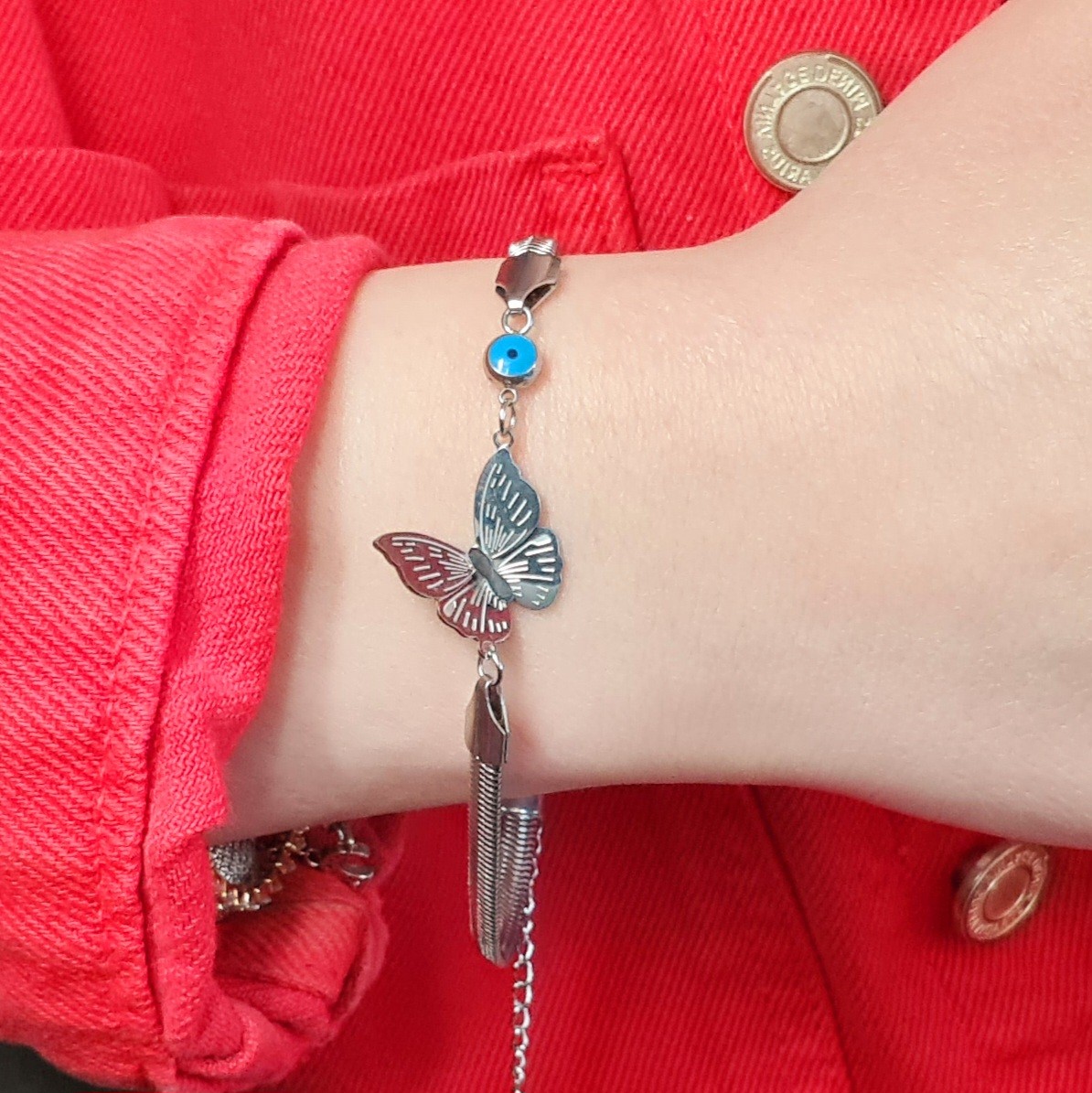 Kelebek Figürlü Gümüş Renk Çelik Bileklik – Nazar Detaylı, Ayarlanabilir Uzunluk (19+6 cm, 5 mm Zincir)
