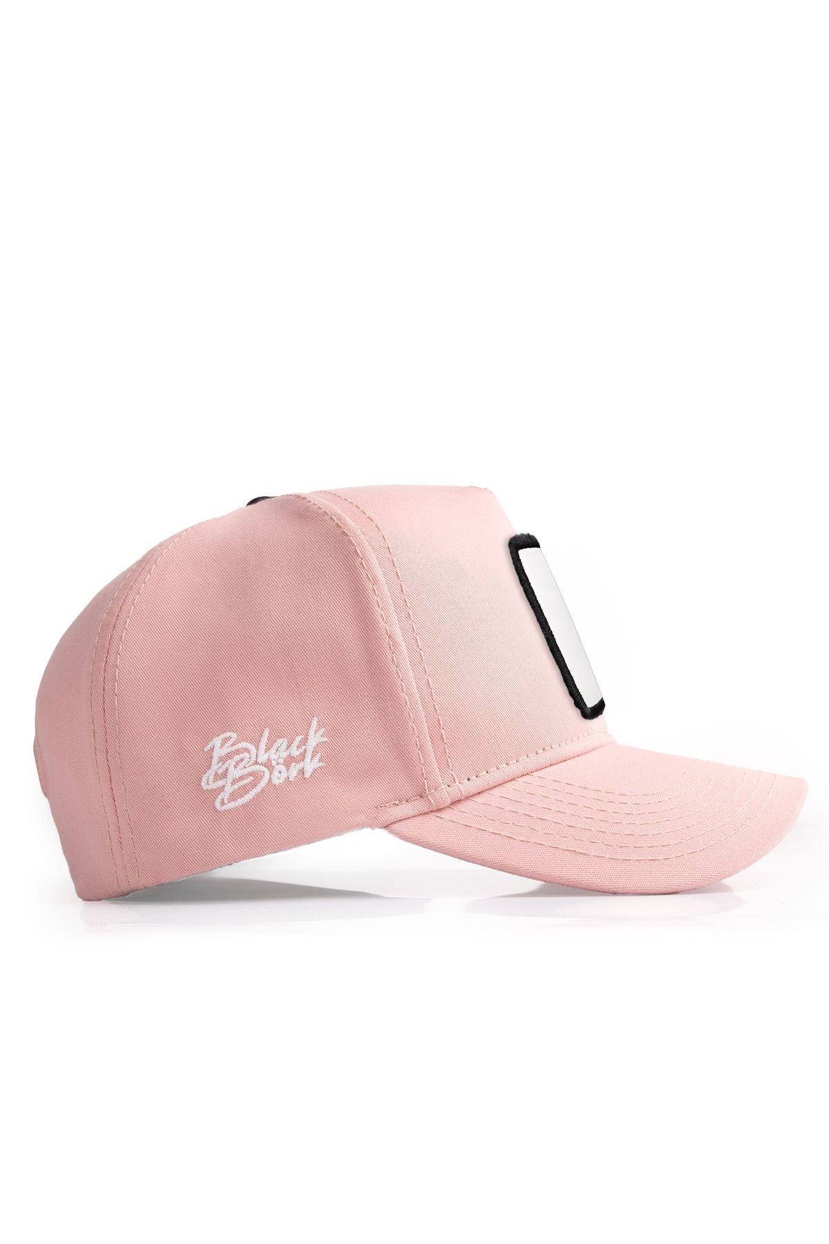 Salmon-colored baseball cap with I Don't Care logo