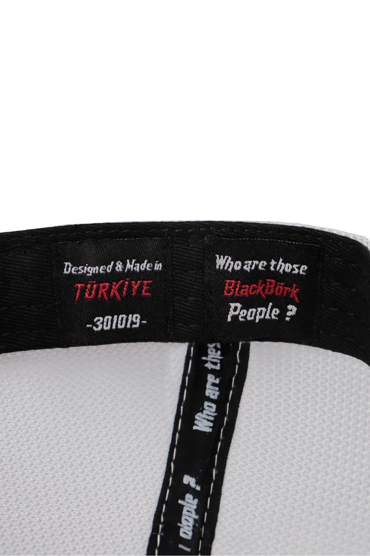 Gorra trucker blanco-negro Cordura con logo de Black