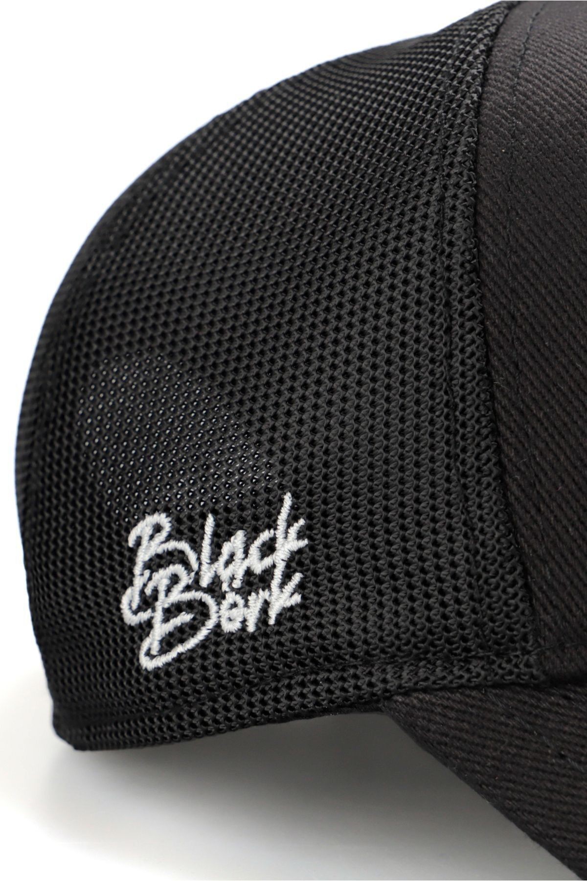 Gorra trucker negra con logo de See You Later Never