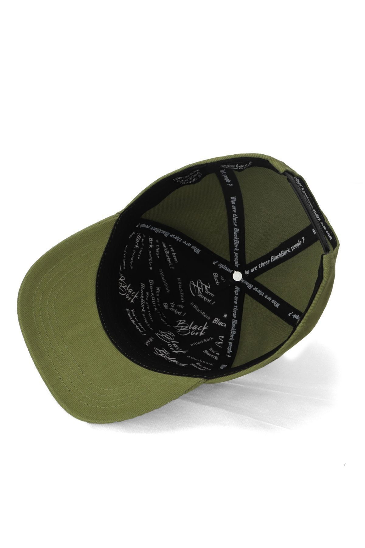 Green baseball cap for children with lion logo