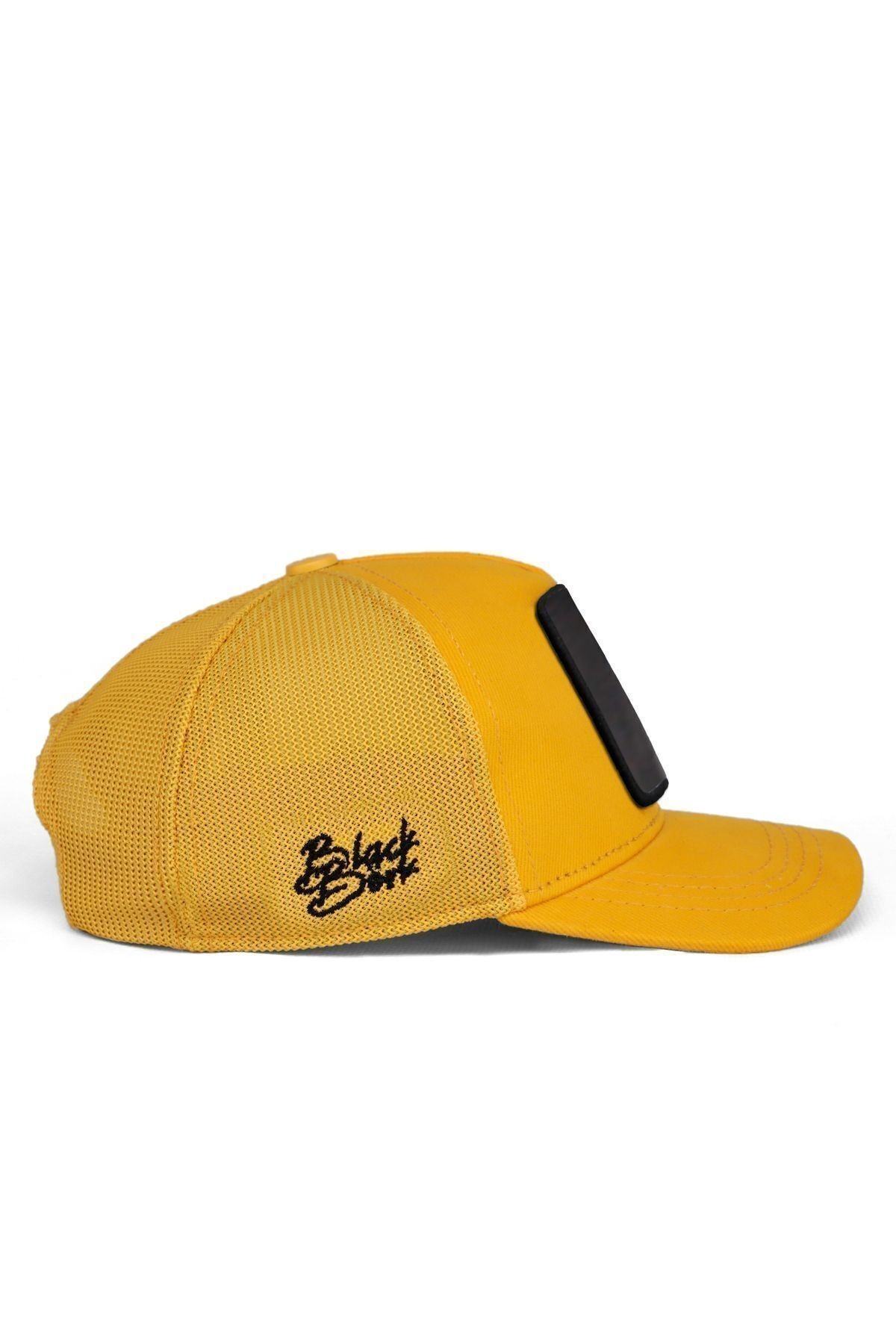 Gorra trucker infantil amarilla con logo de león