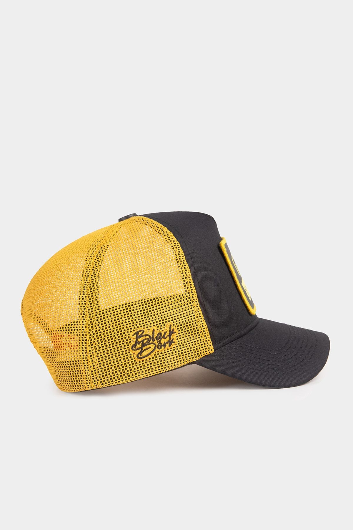 Gorra trucker negre-groc amb logo de You Can't Stop Me