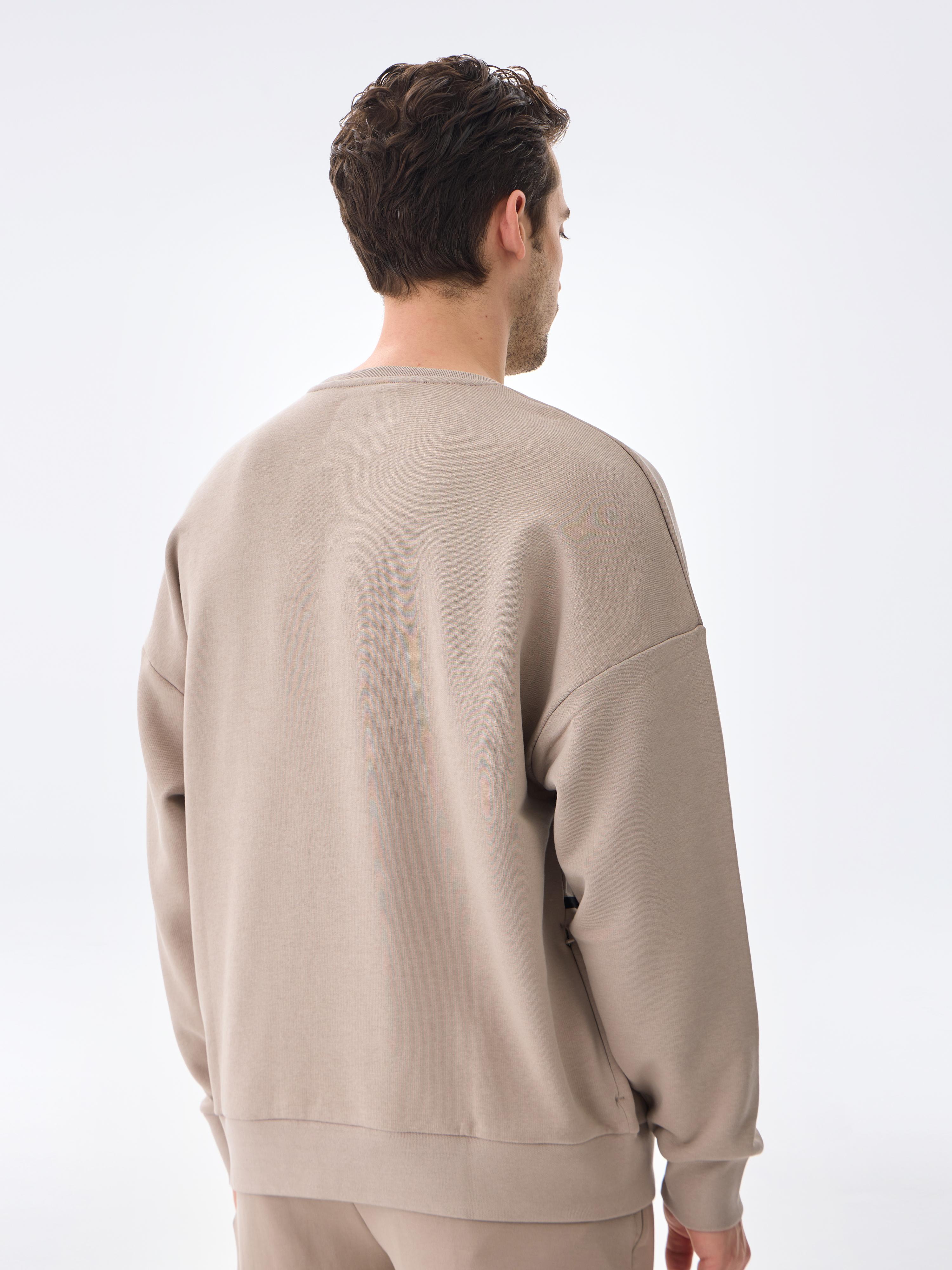 PERFORMANCE COTTON SWEAT