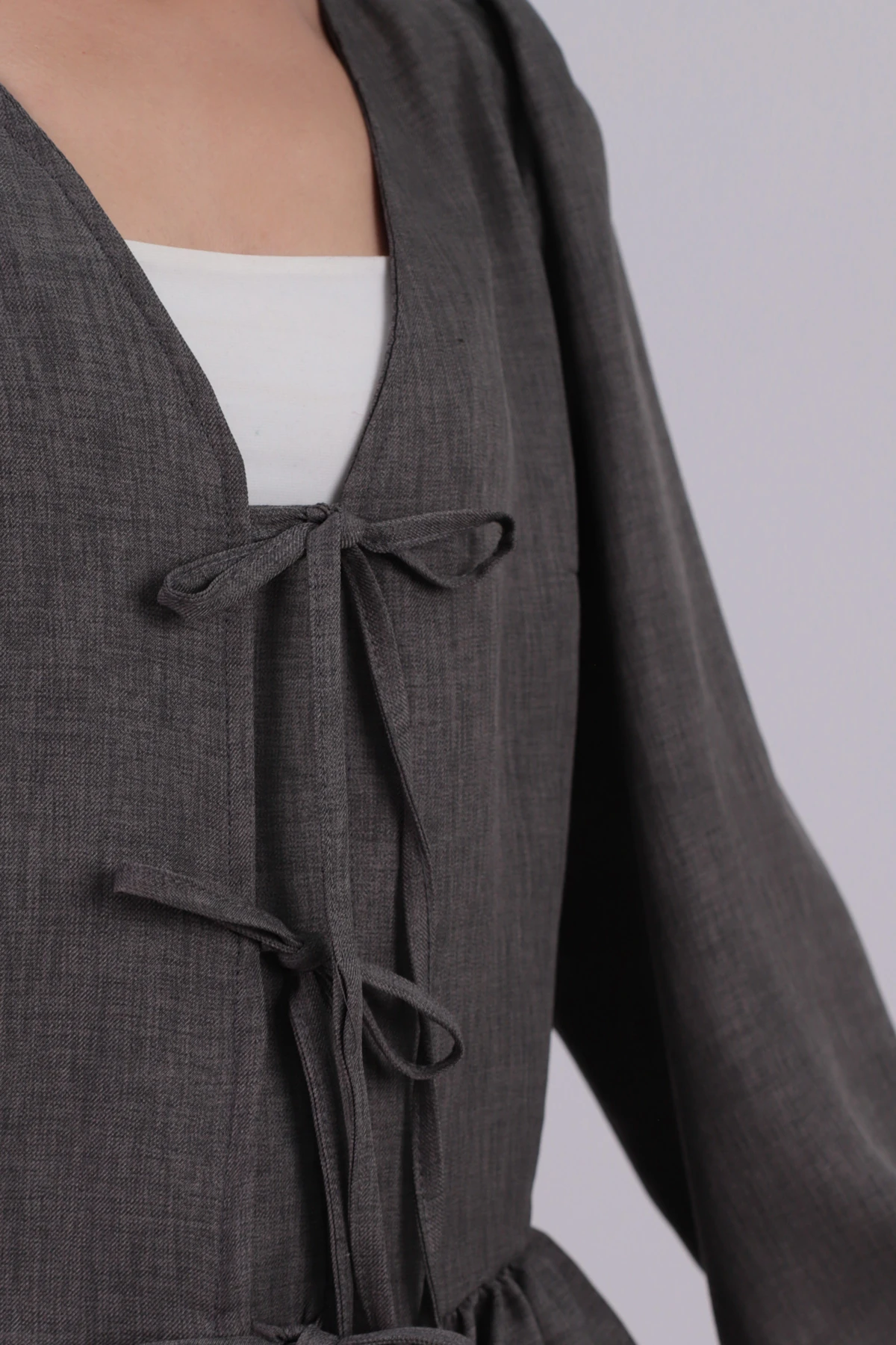 Kadın Füme Önden Bağlamalı Etek Ucu Fırfırlı Kolları Lastikli Bluz ARM-26K001019