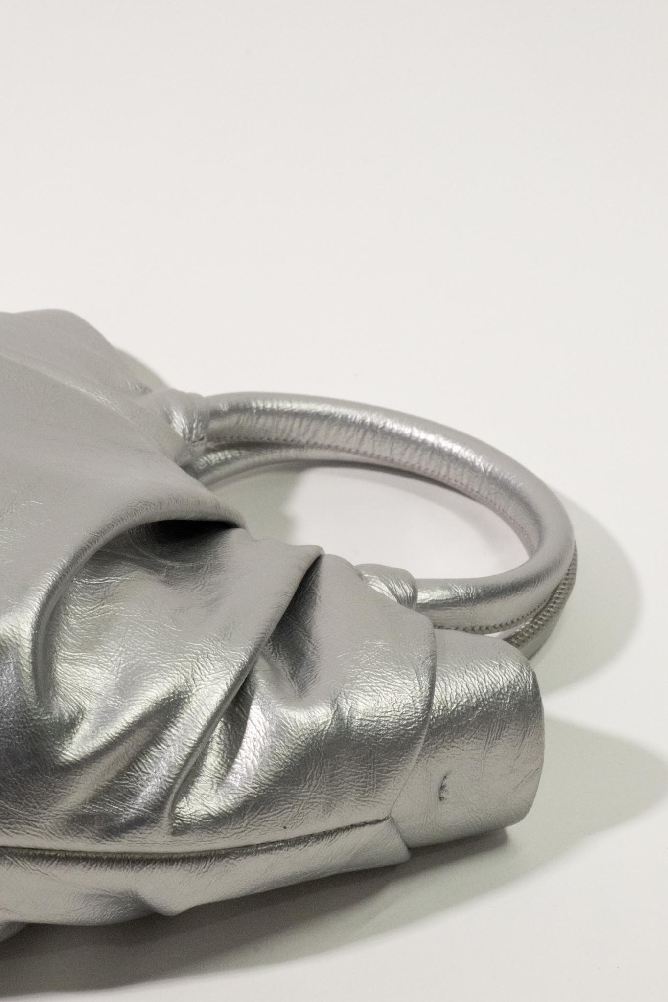 Metalik Saplı Oval Çanta