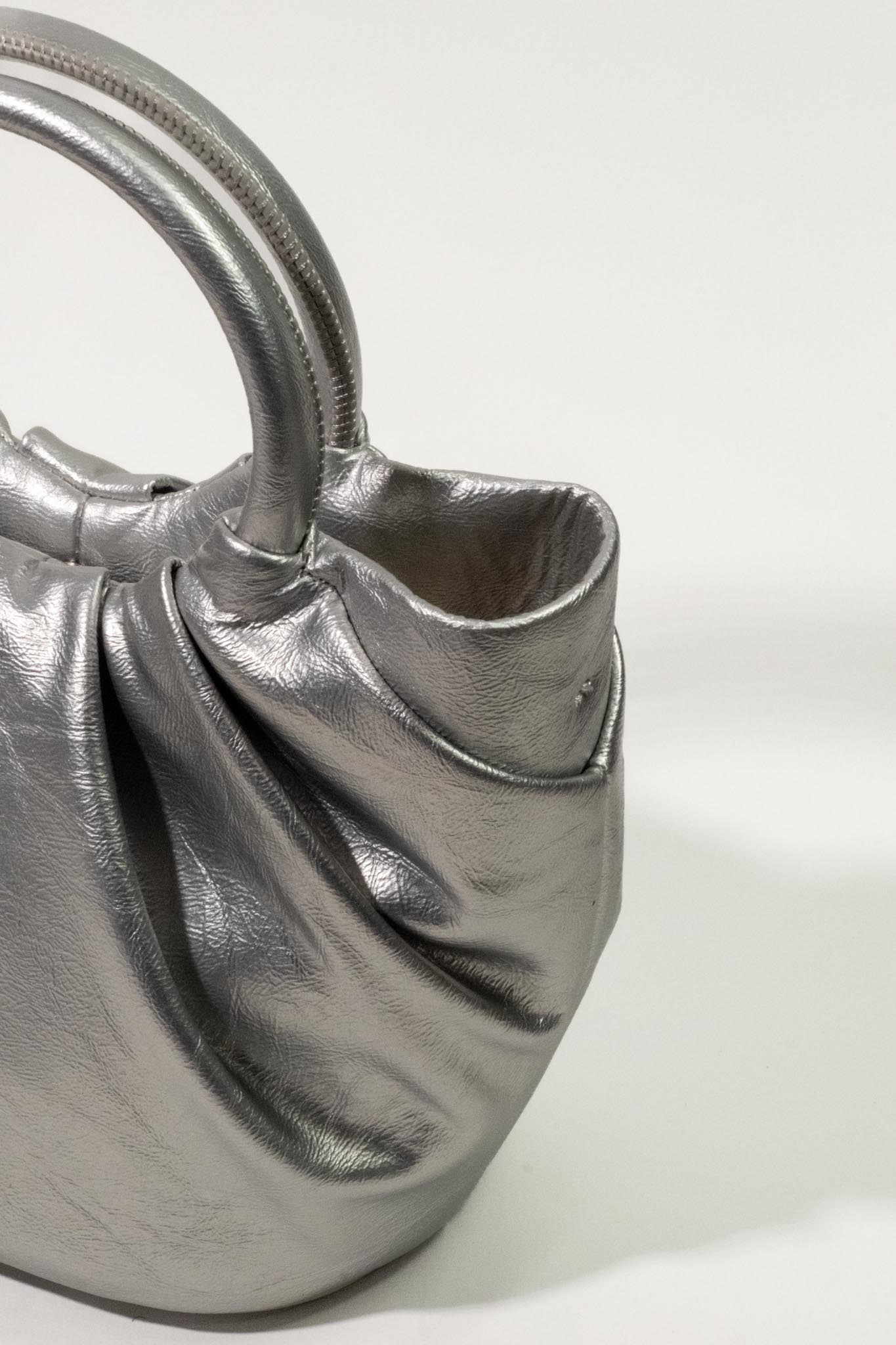 Metalik Saplı Oval Çanta