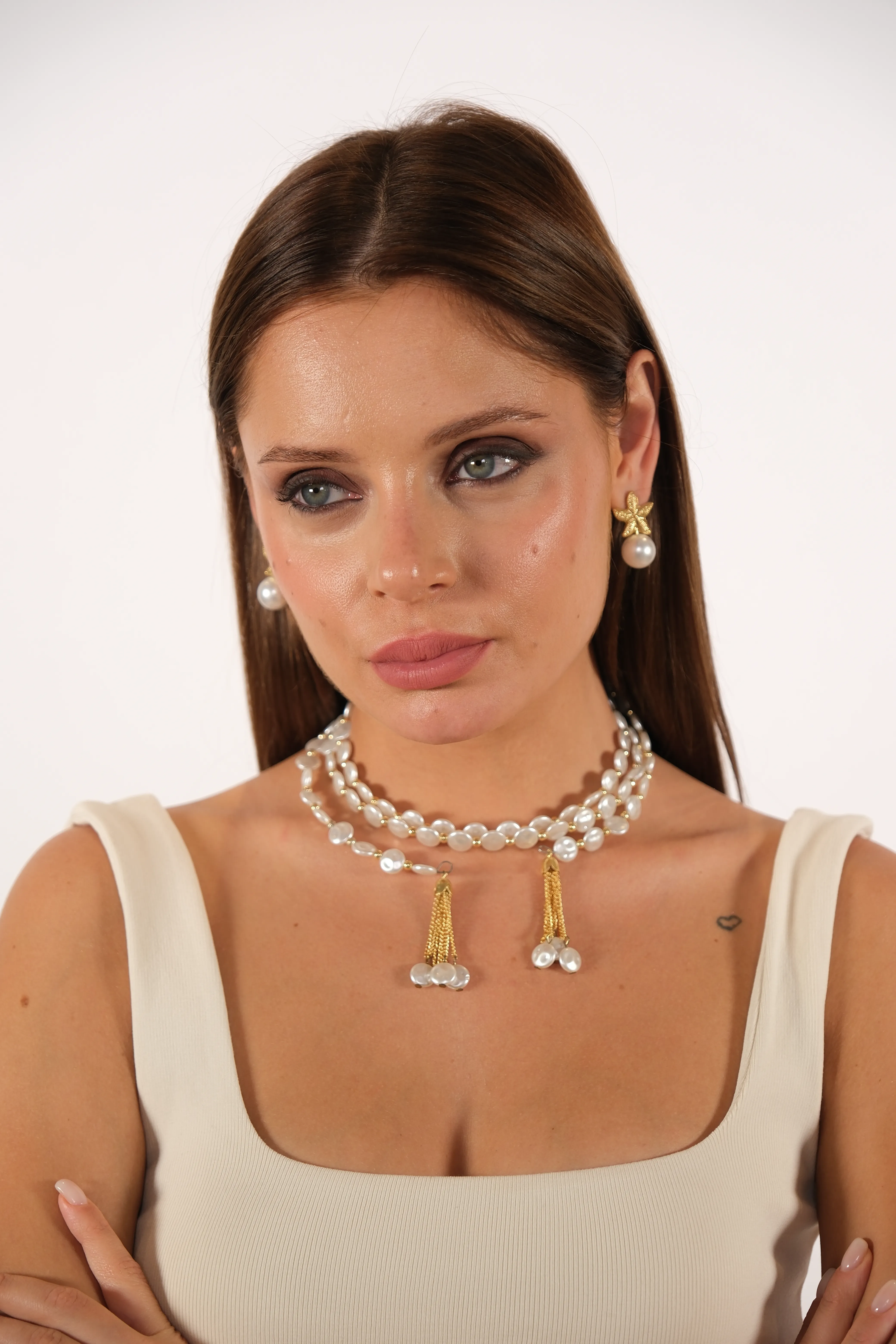 Altın kaplama inci detay yıldız küpe