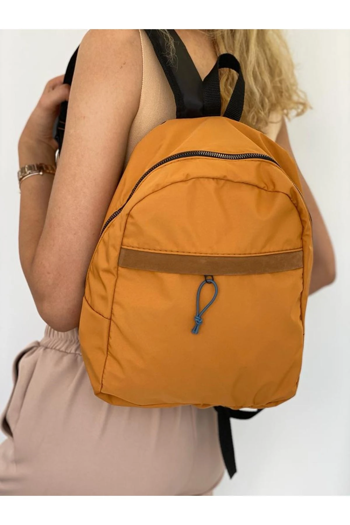 fermuarı lastikli sırt çantası