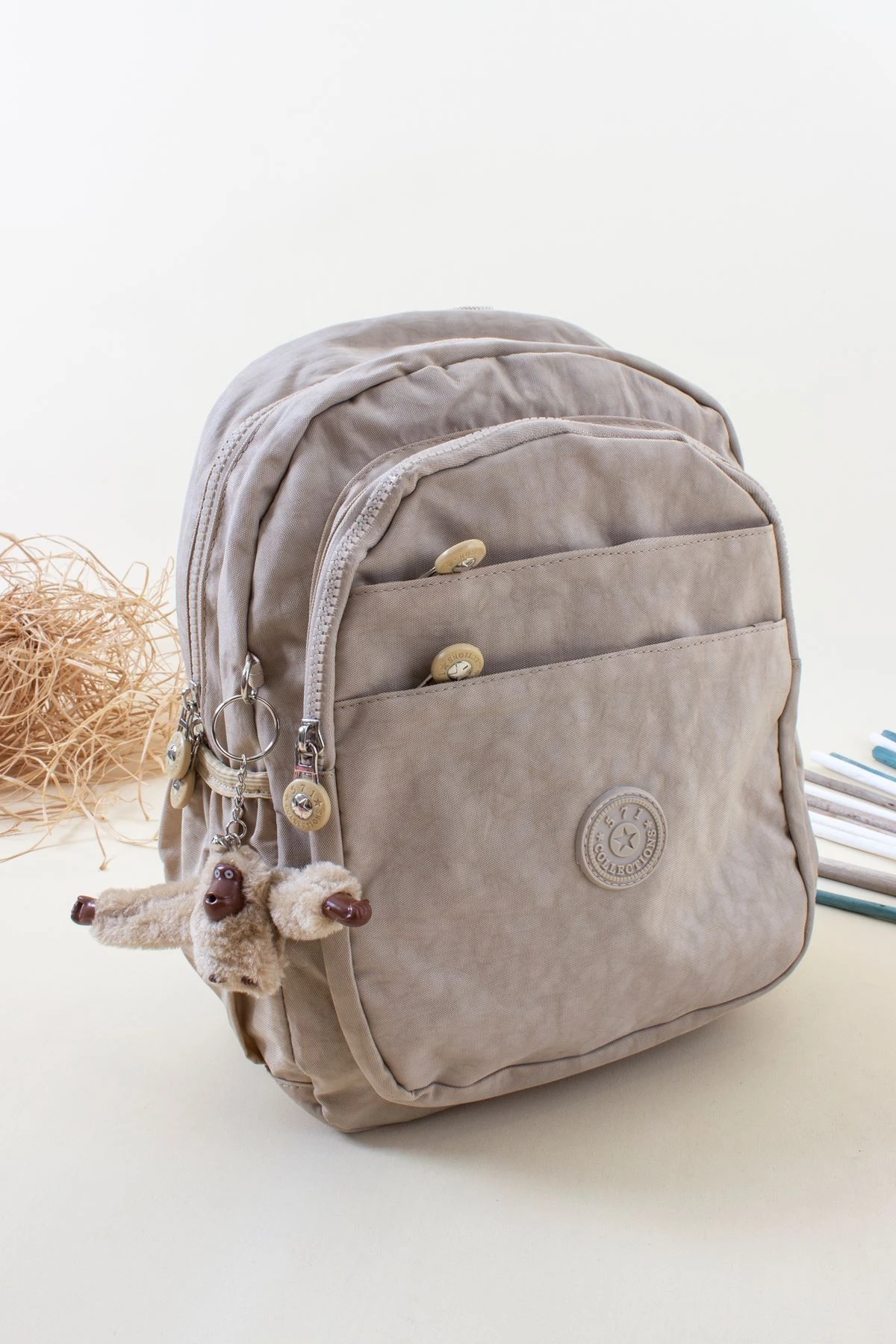 KRINKIL SU GEÇİRMEZ ÖNDEN İKİ FERMUARLI KÜÇÜK SIRT ÇANTASI