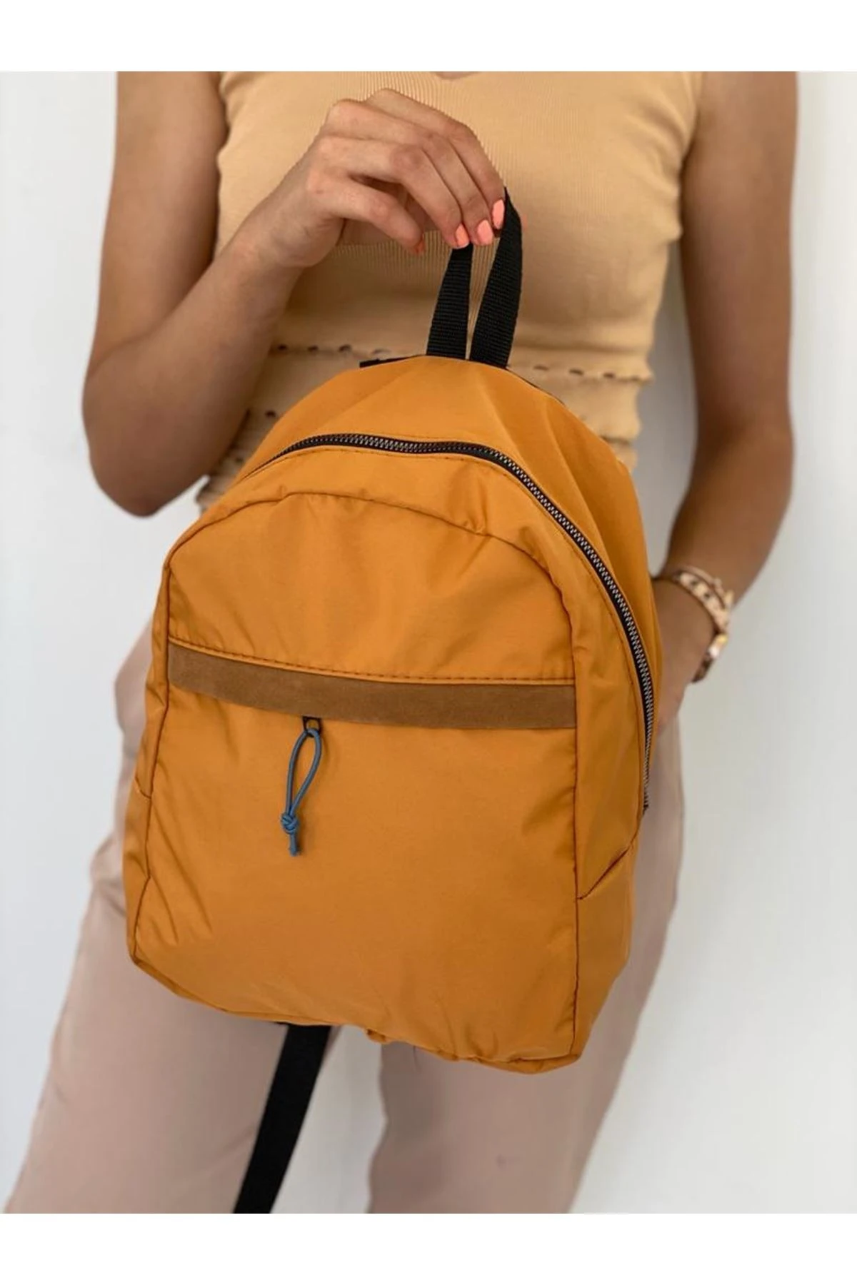 fermuarı lastikli sırt çantası