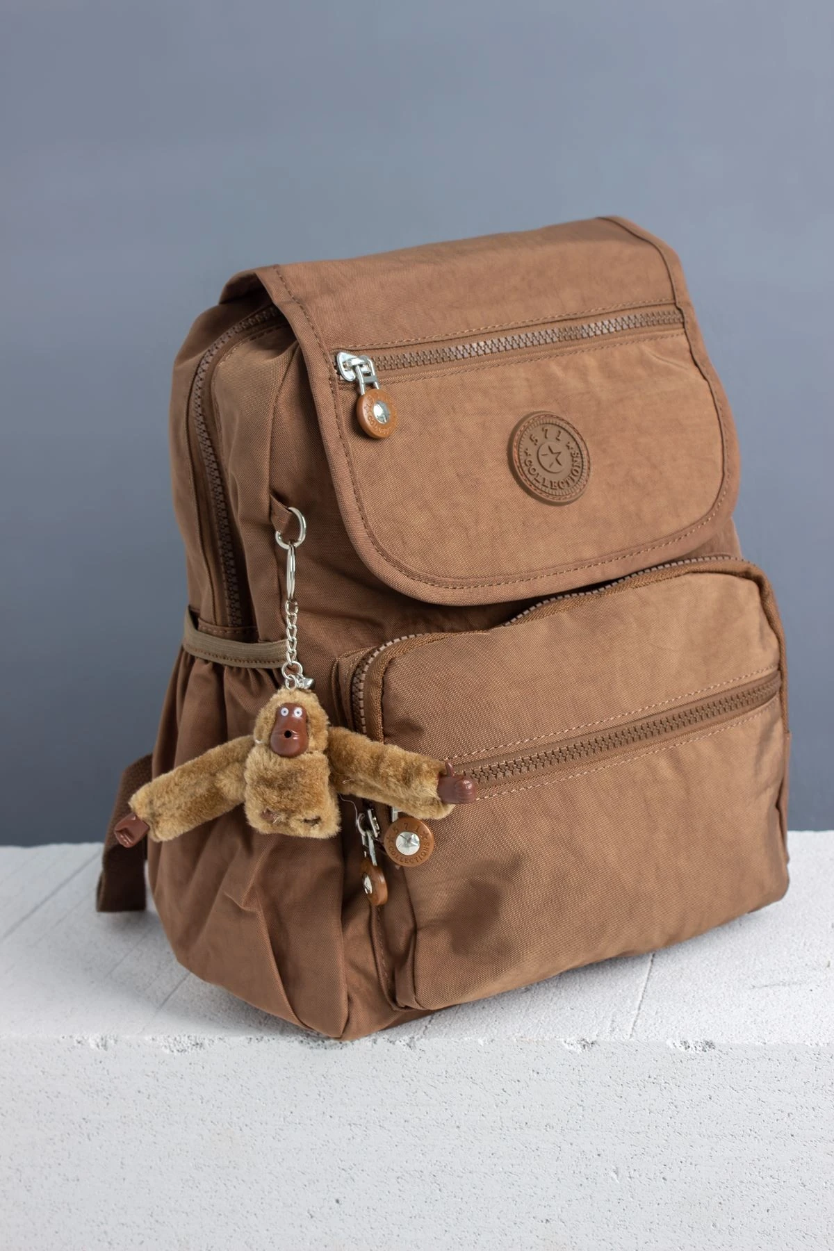 KRINKIL SU GEÇİRMEZ KÜÇÜK KAPAKLI SIRT ÇANTASI