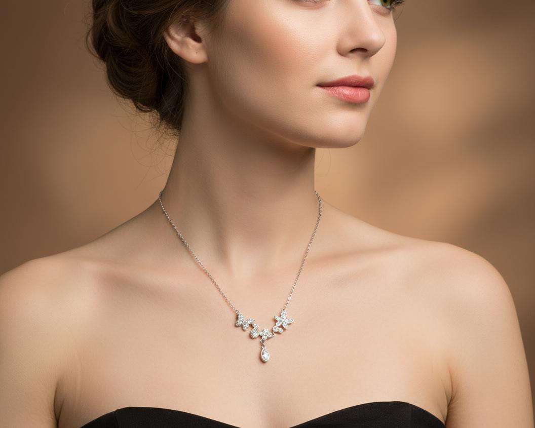 Asimetrik Sarkıt Kelebek ve Çiçek Desenli Kolye – Zarif ve Modern Kadın Takı Modeli