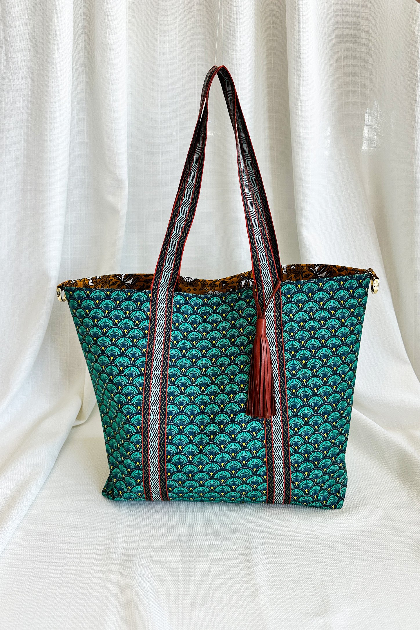 Retro and Floral Patterned Reversible Leather Tassel Bag