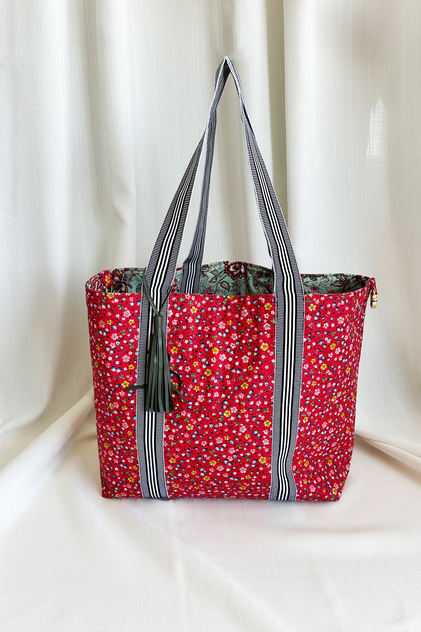 Floral Patterned Reversible Leather Tassel Bag