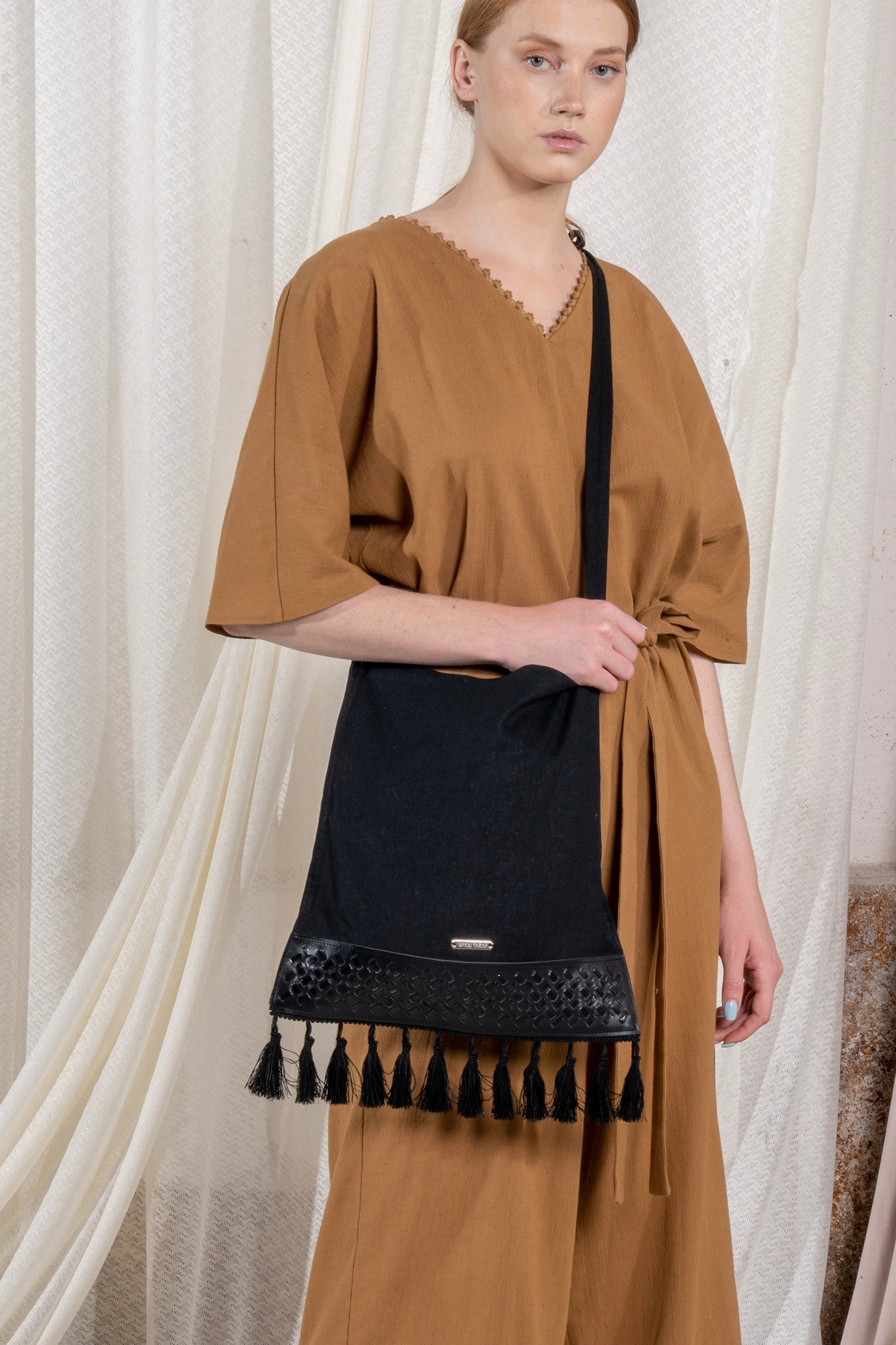 Leather Embroidered Tasseled Linen Saddle Bag