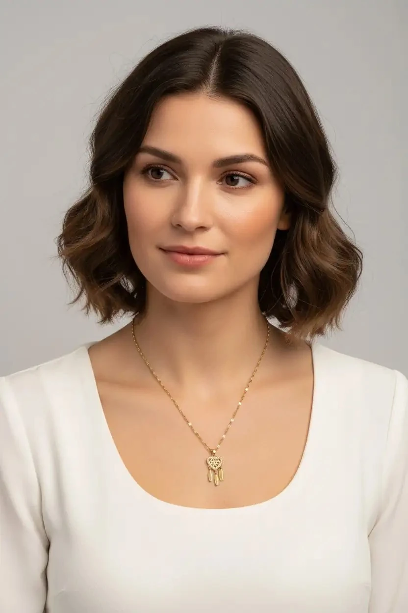 Altın Kaplama Kalp Motifli Tüy Detaylı Çelik Kolye - PAN09